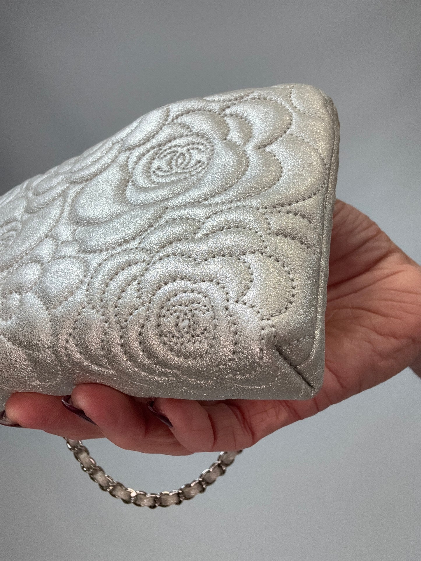Chanel Camellia Silver VIP Pochette  back right bottom corner