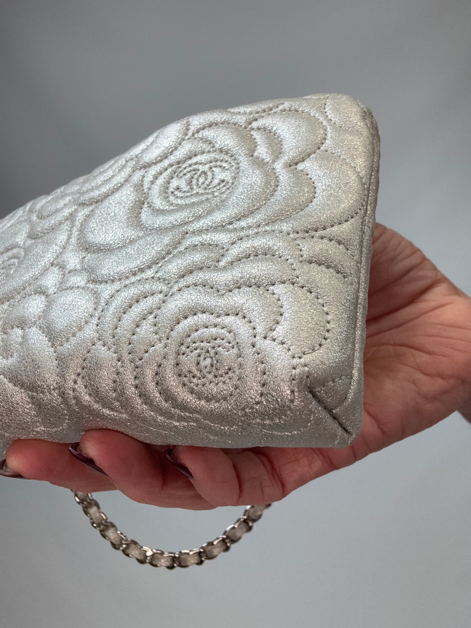 Chanel Camellia Silver VIP Pochette  back right bottom corner
