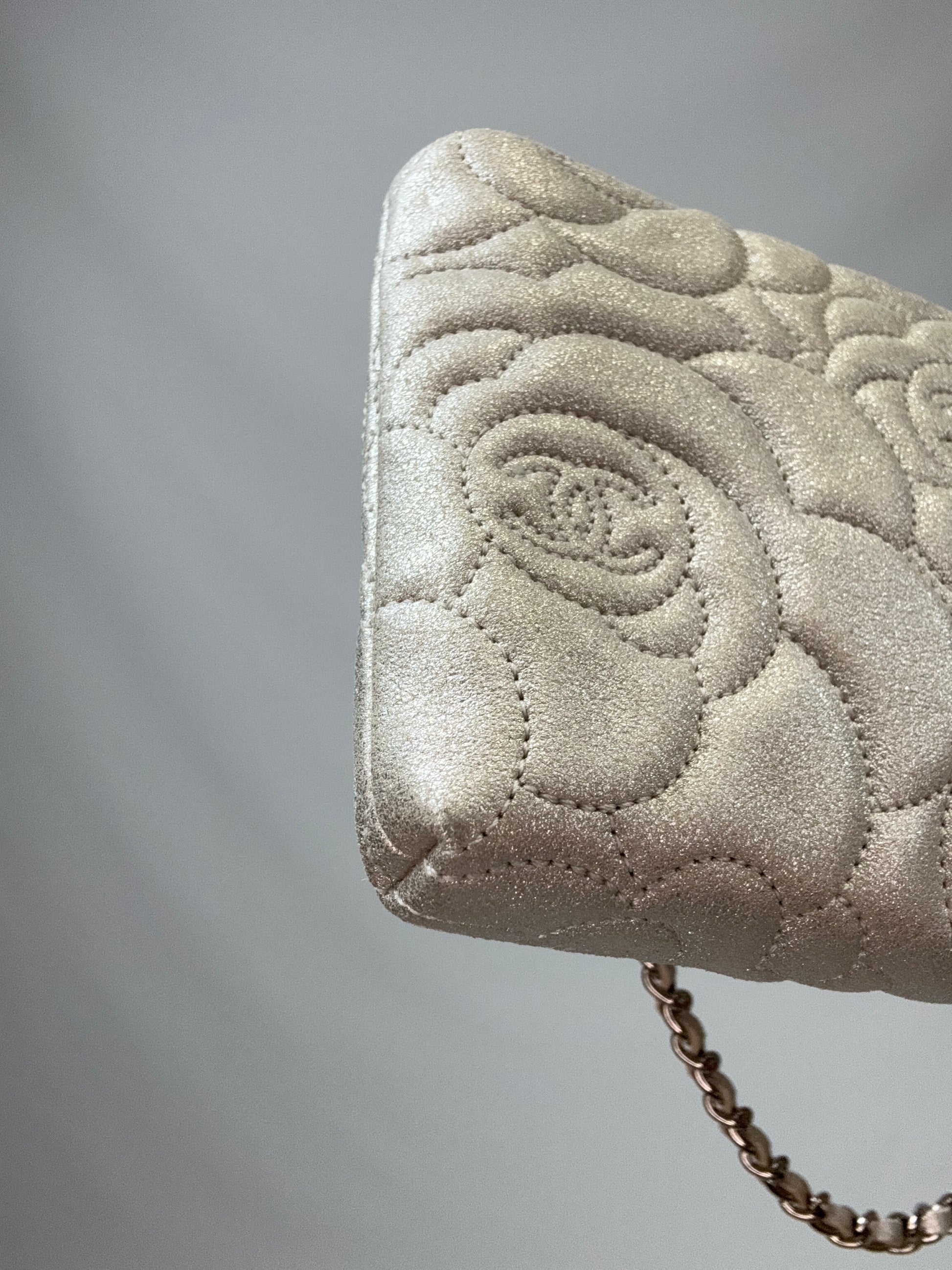 Chanel Camellia Silver VIP Pochette  front left bottom corner