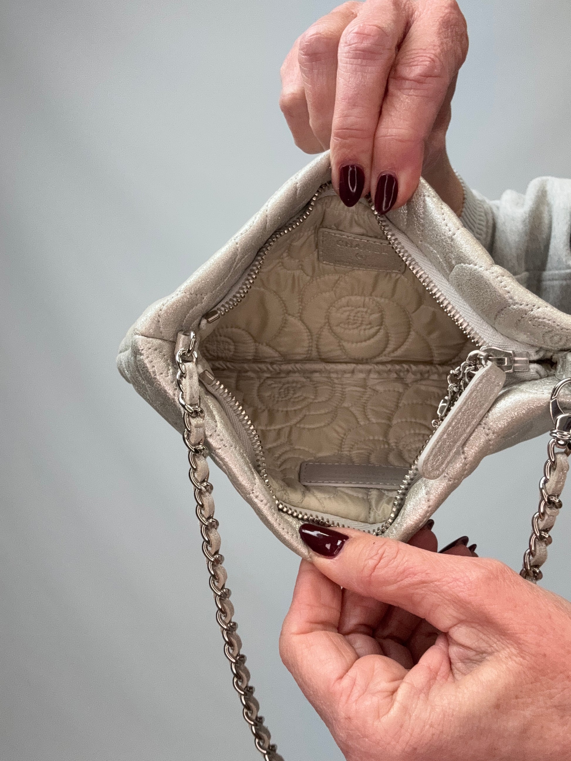 Chanel Camellia Silver VIP Pochette  interior