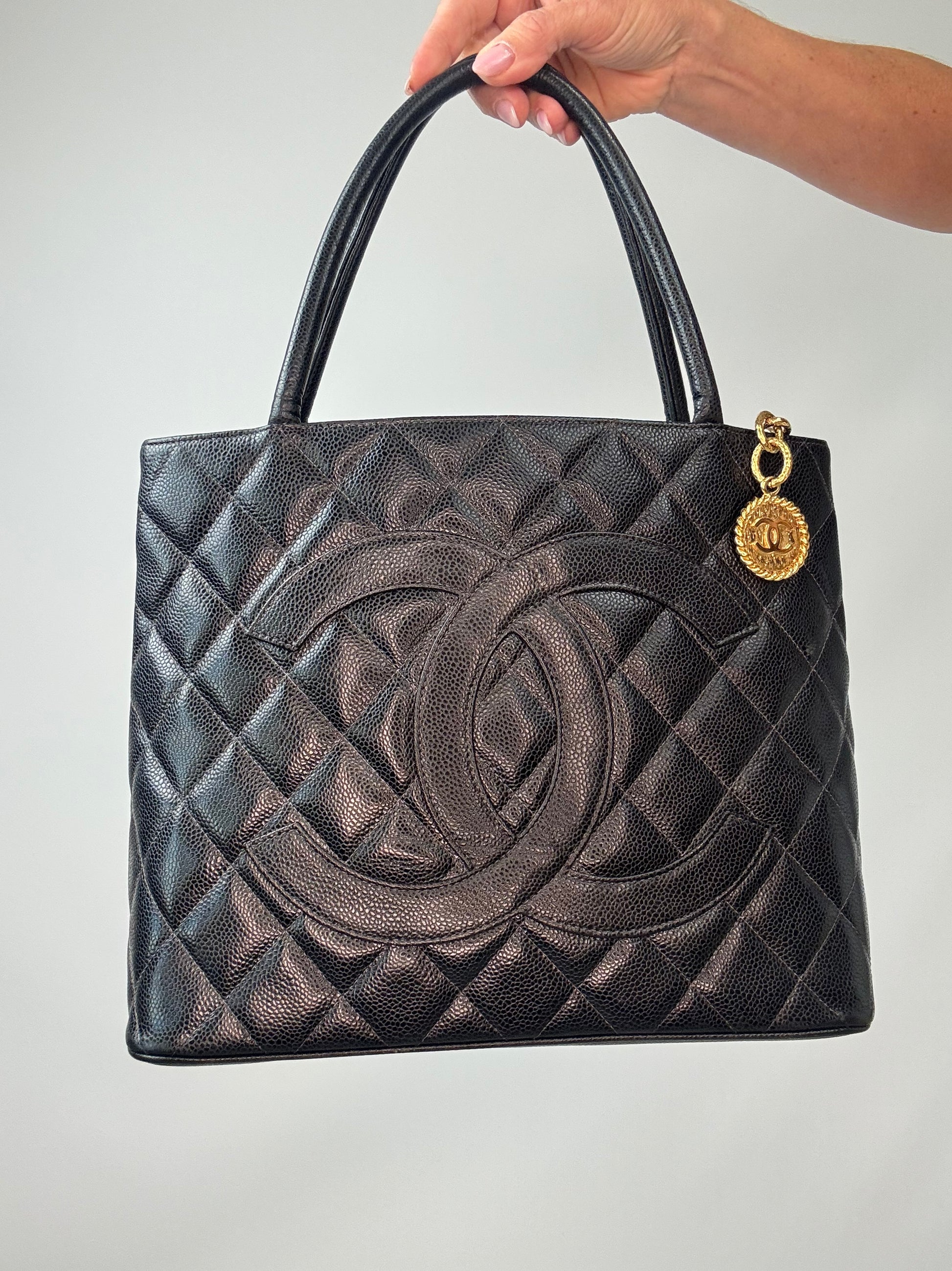 Chanel Caviar Quilted Medallion Tote front of handbag
