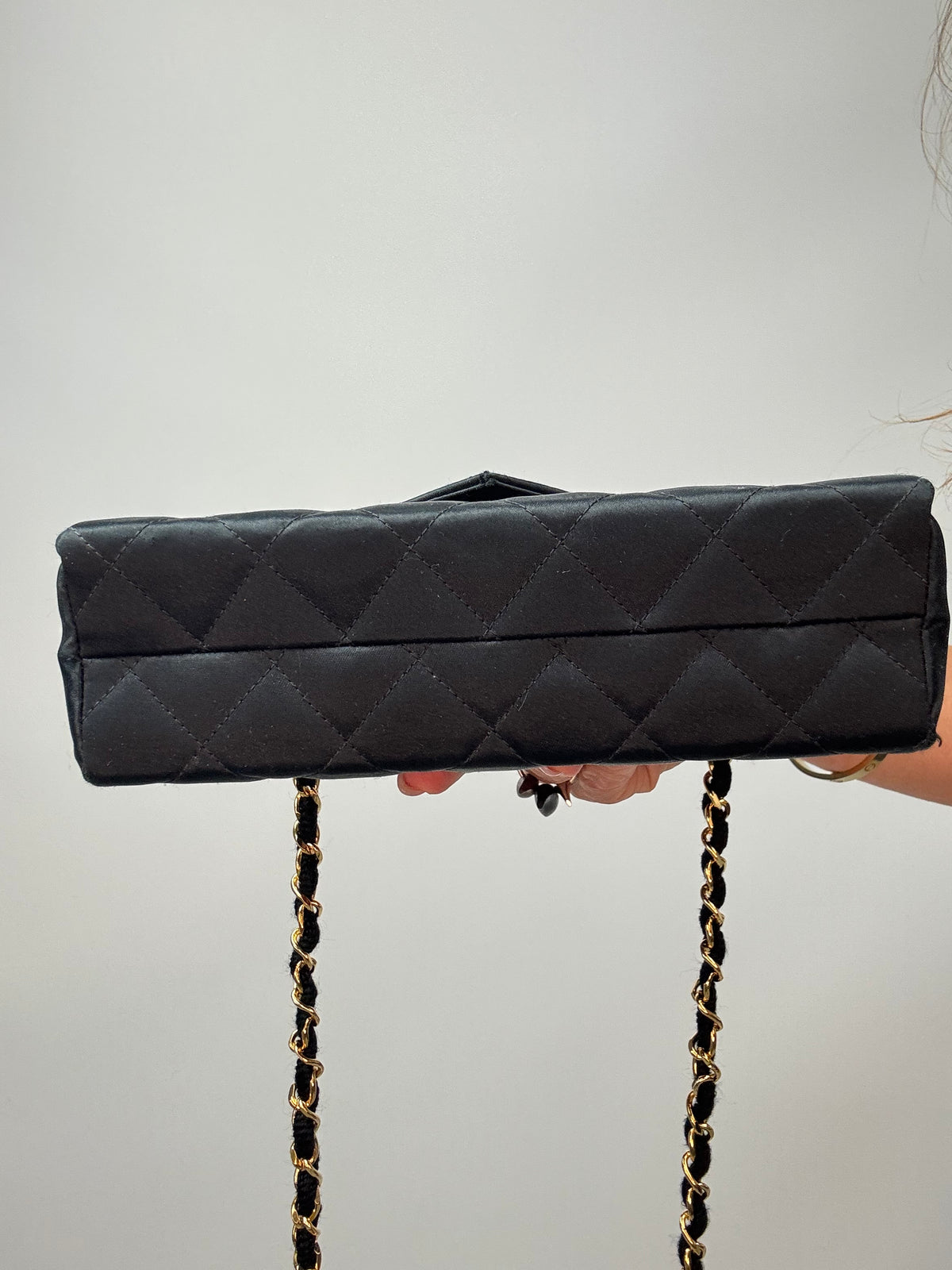 Chanel CC Black Quilted Satin Envelope Bag bottom of handbag
