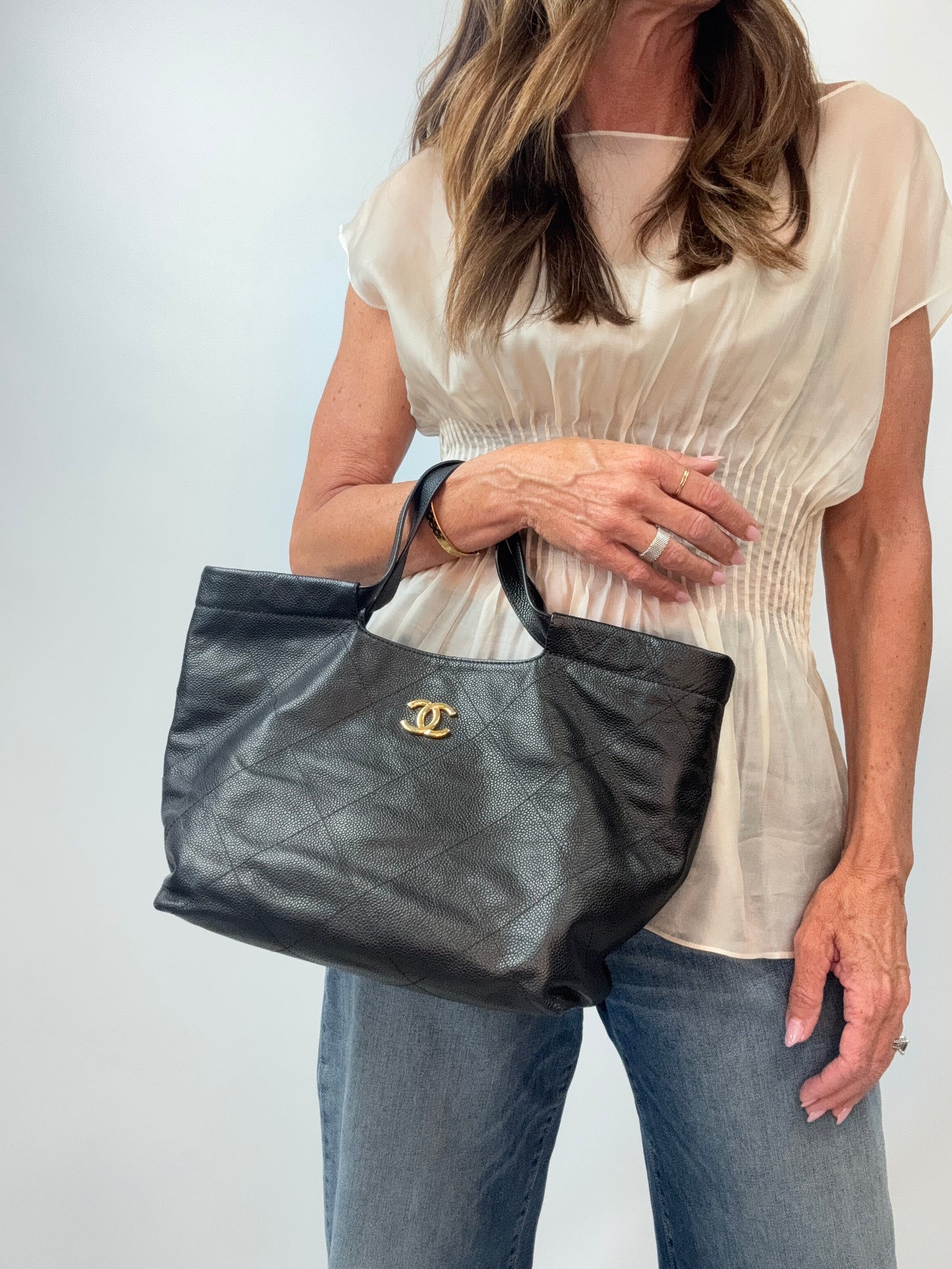 Chanel CC Quilted Caviar Leather Shopping Tote modeled