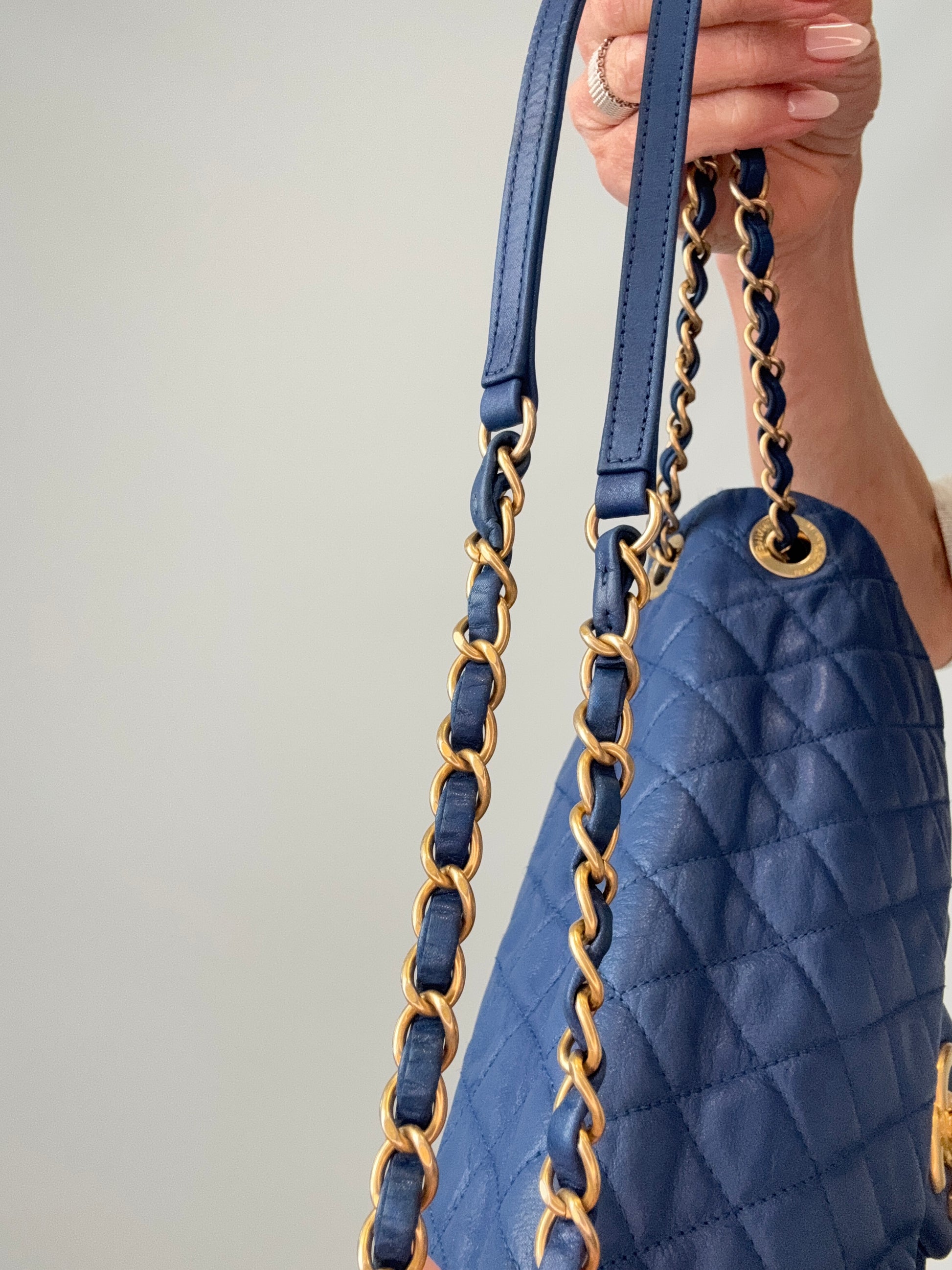 Chanel Classic Quilted Leather Flap Bag in Blue left side of chain strap