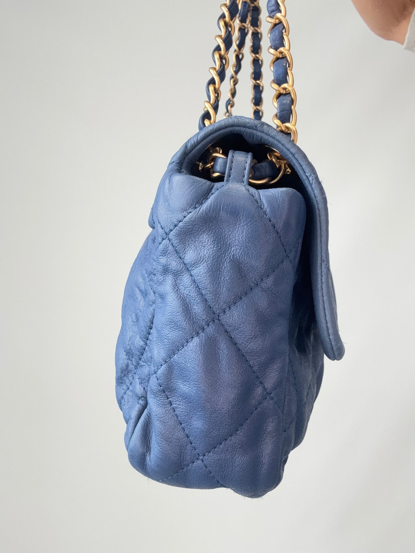 Chanel Classic Quilted Leather Flap Bag in Blue left side of handbag