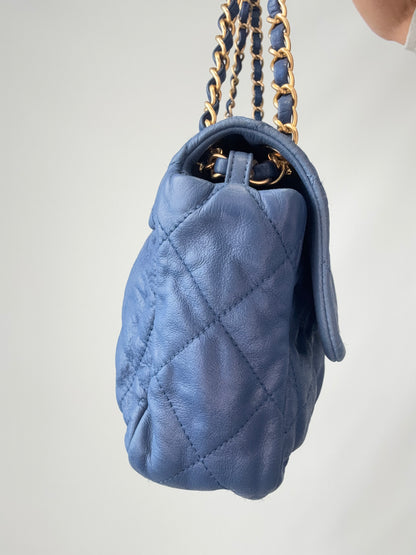 Chanel Classic Quilted Leather Flap Bag in Blue left side of handbag