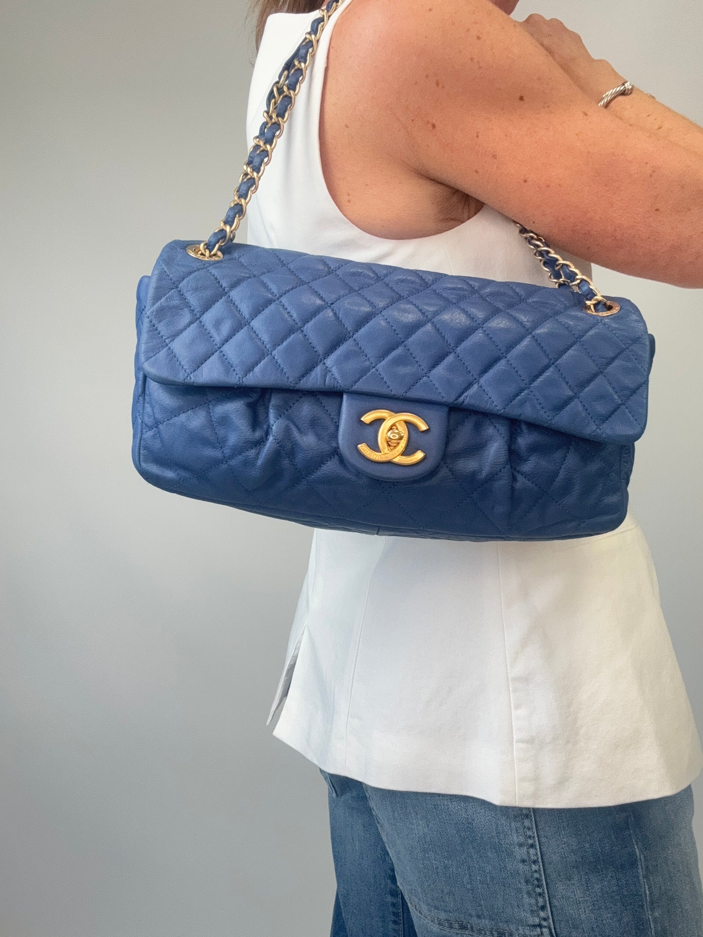 Chanel Classic Quilted Leather Flap Bag in Blue modeled 3