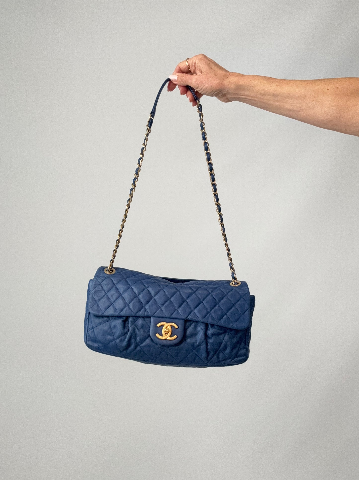 Chanel Classic Quilted Leather Flap Bag in Blue with strap extended