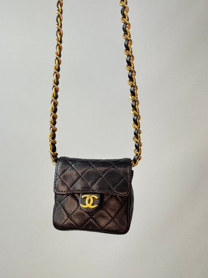 Chanel Micro Quilted Flap Bag front of bag