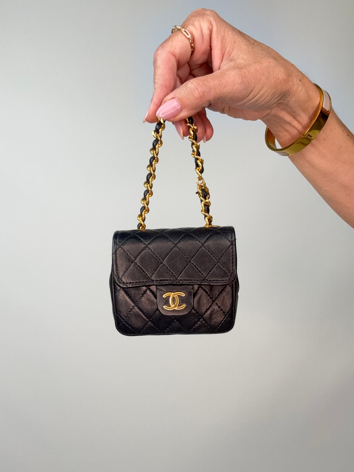 Chanel Micro Quilted Lambskin Flap Chain Belt Bag front of bag