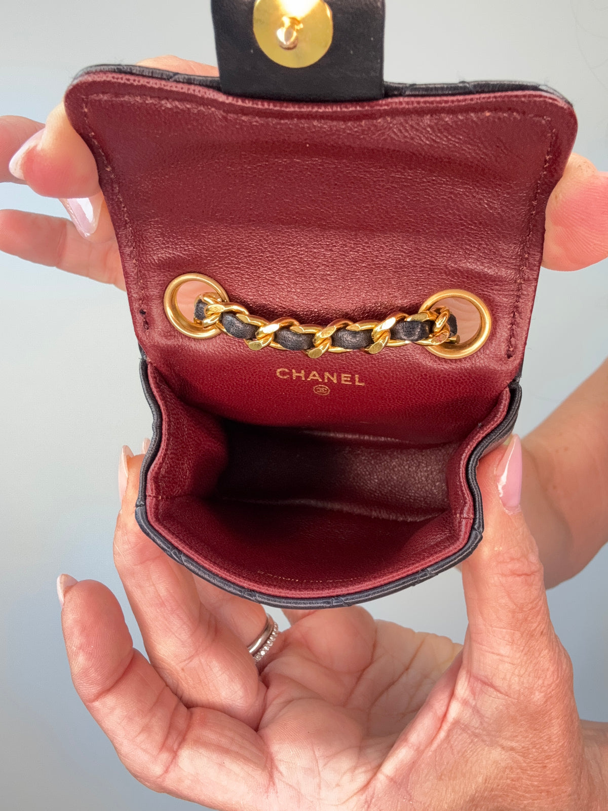 Chanel Micro Quilted Lambskin Flap Chain Belt Bag interior of bag
