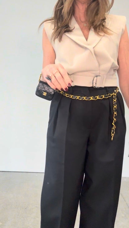 Chanel Micro Quilted Lambskin Flap Chain Belt Bag modeled 2