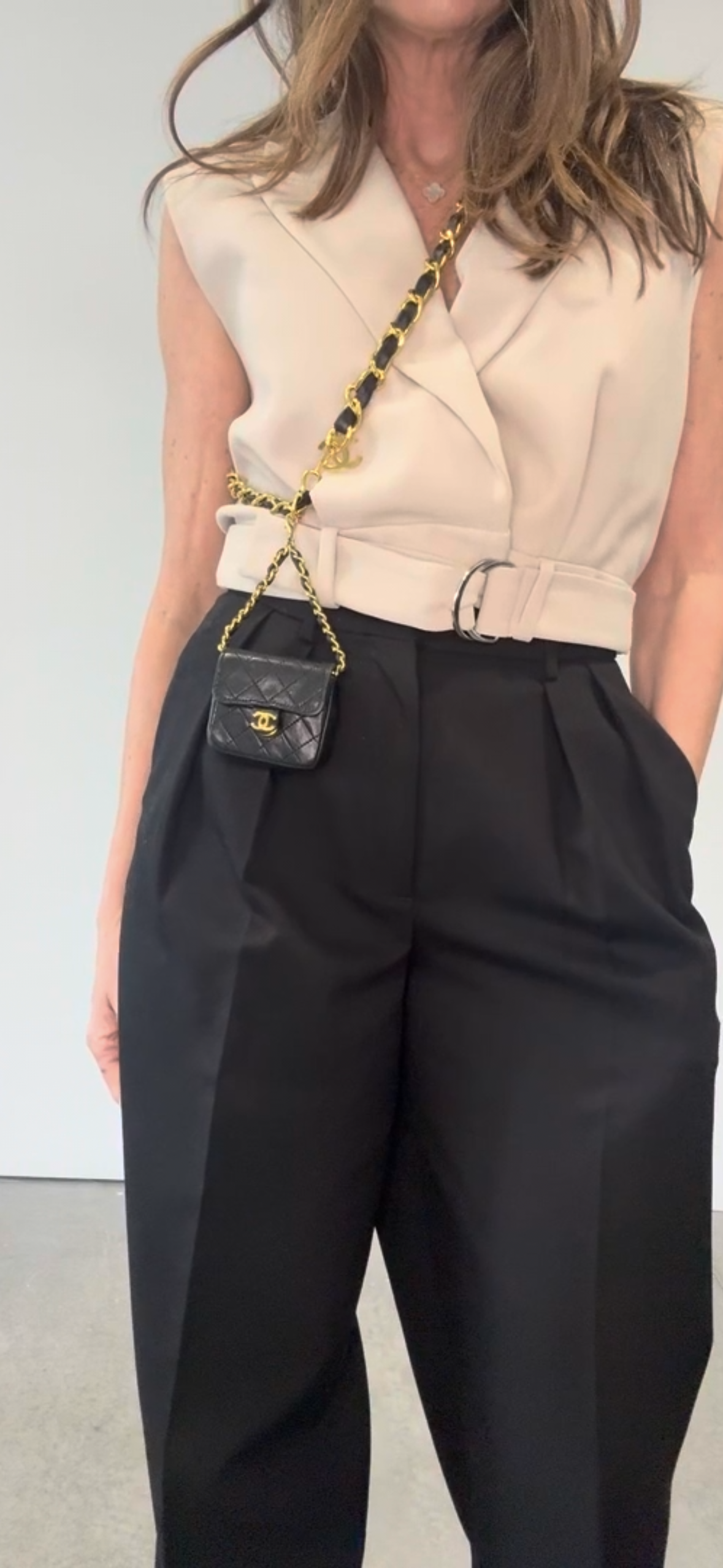  Chanel Micro Quilted Lambskin Flap Chain Belt Bag modeled 5