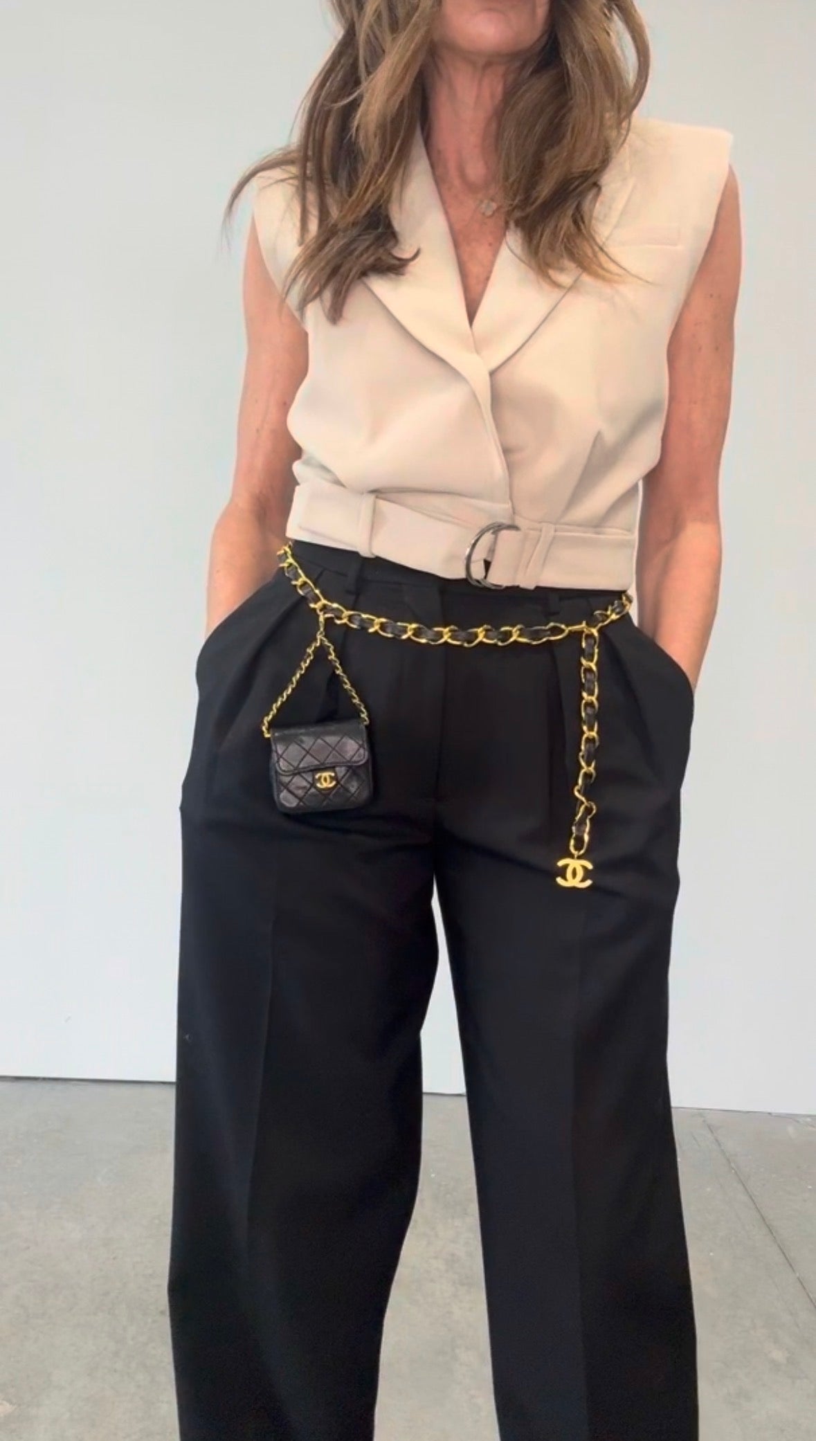 Chanel Micro Quilted Lambskin Flap Chain Belt Bag modeled