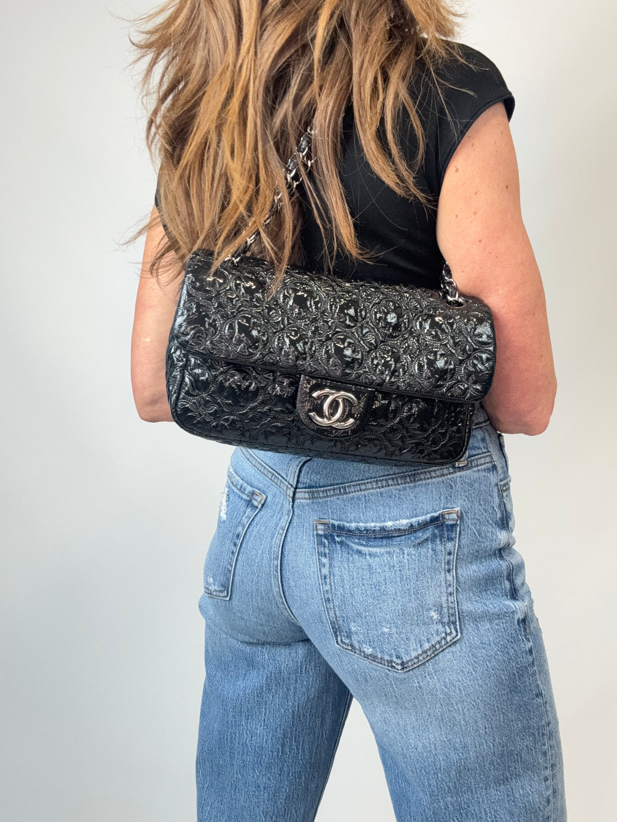 Chanel Patent Leather Rock In Moscow Single Flap Bag modeled
