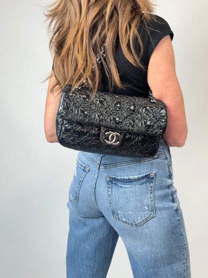 Chanel Patent Leather Rock In Moscow Single Flap Bag modeled