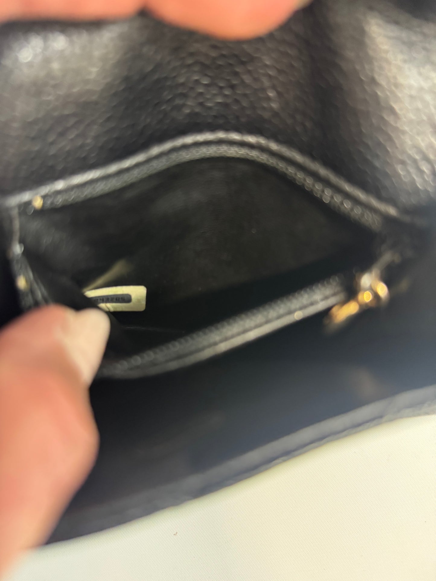 Chanel Quilted Caviar Belt Bag interior pocket