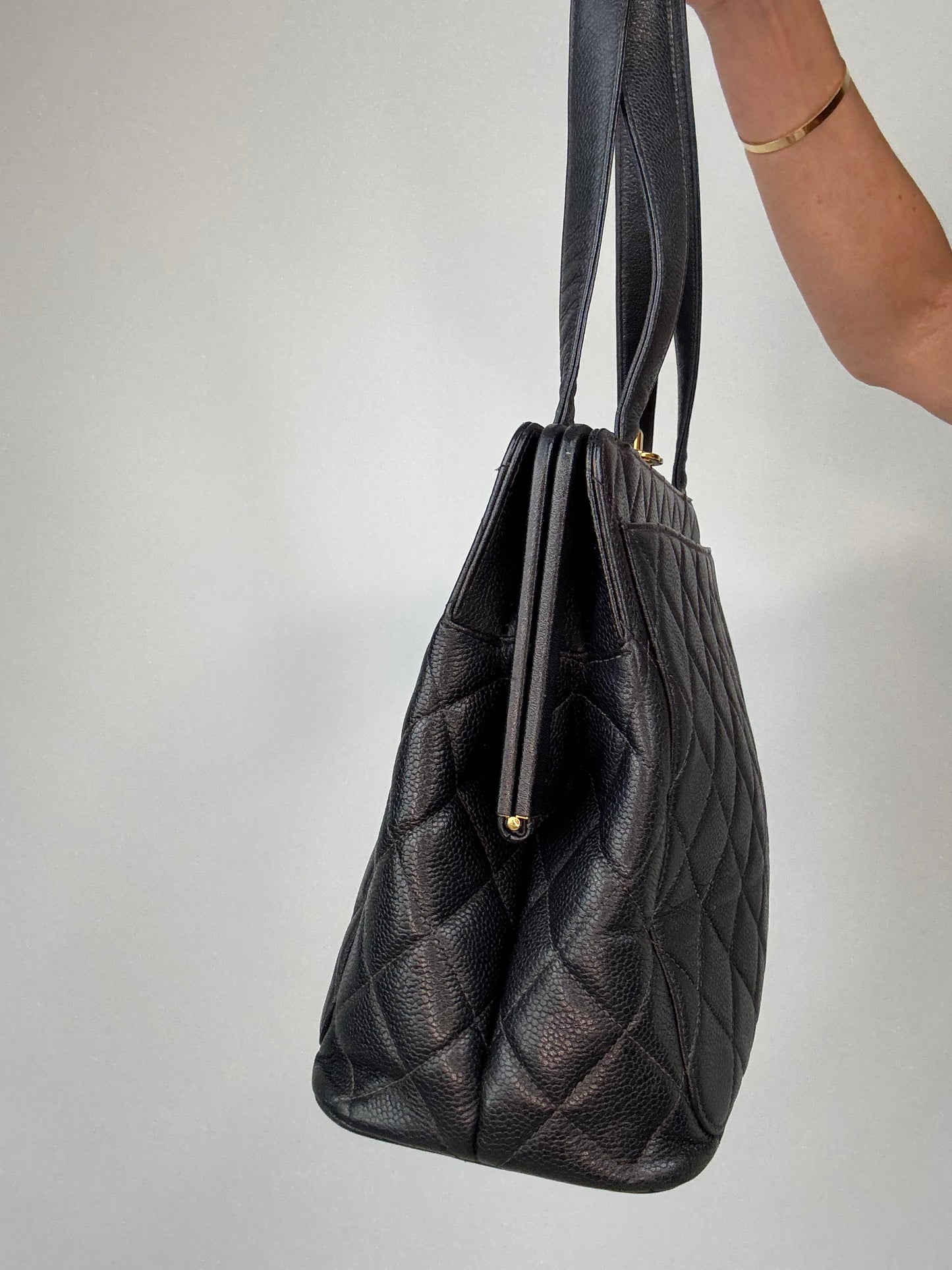 Chanel Quilted Caviar Leather Frame Shoulder Bag left side of bag