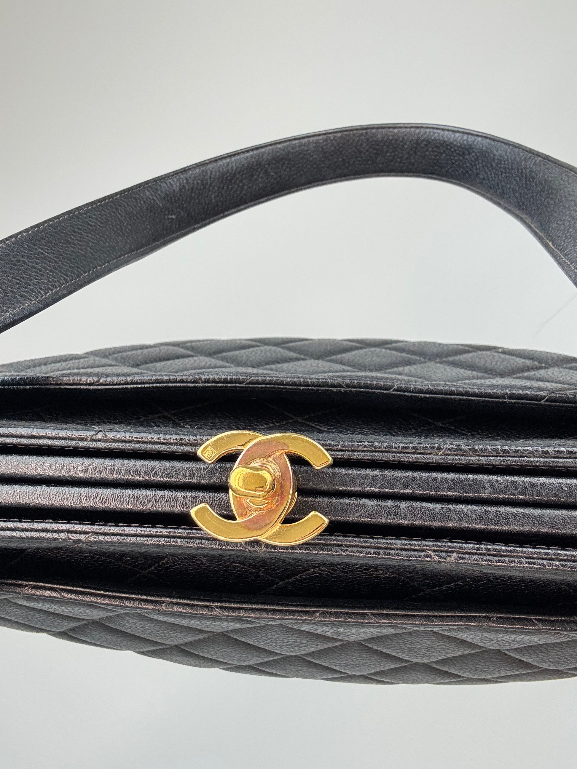 Chanel Quilted Caviar Leather Frame Shoulder Bag top of bag and kiss lock