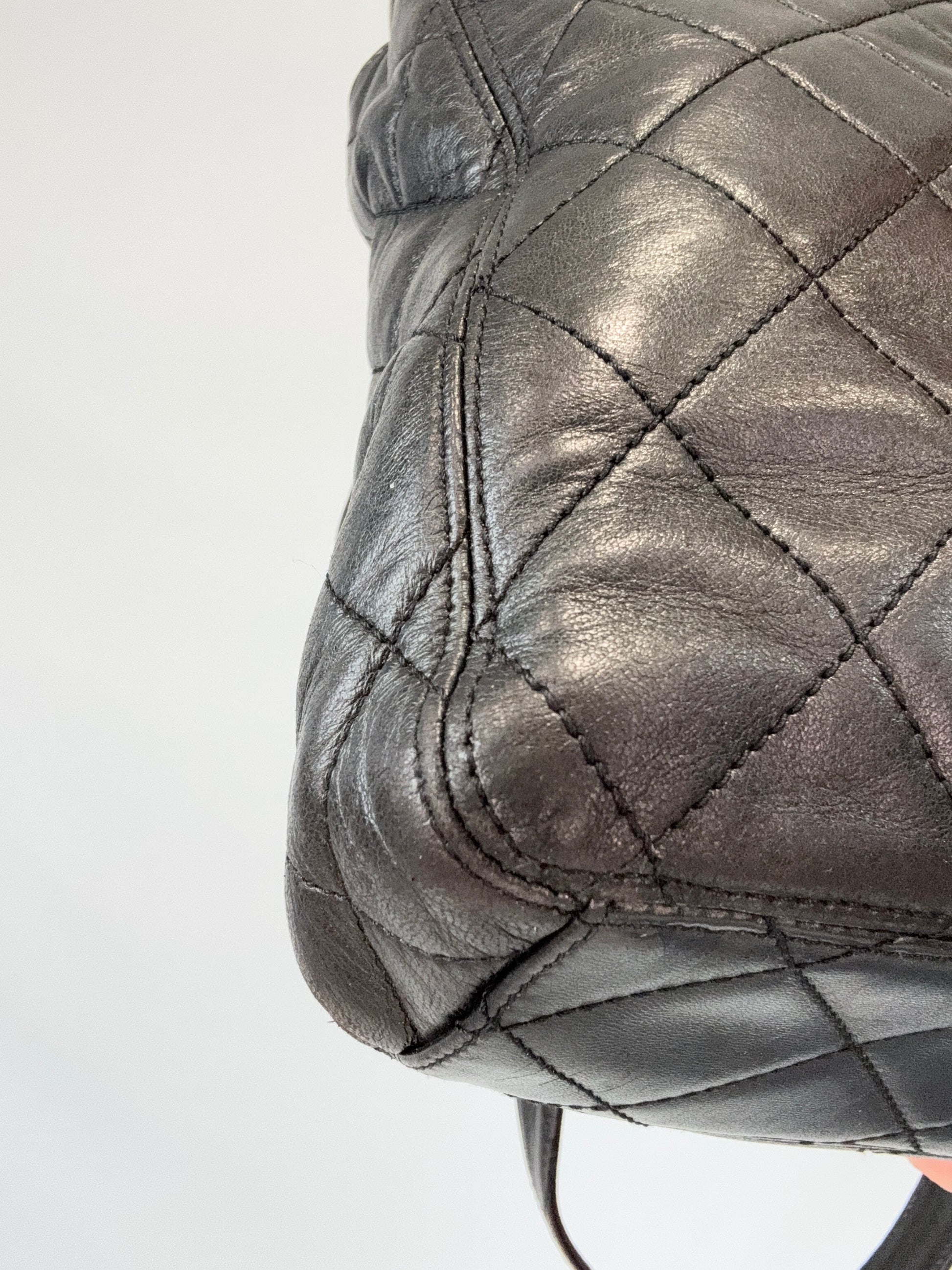 Chanel Quilted Double Pocket Turn Lock Tote back left bottom corner