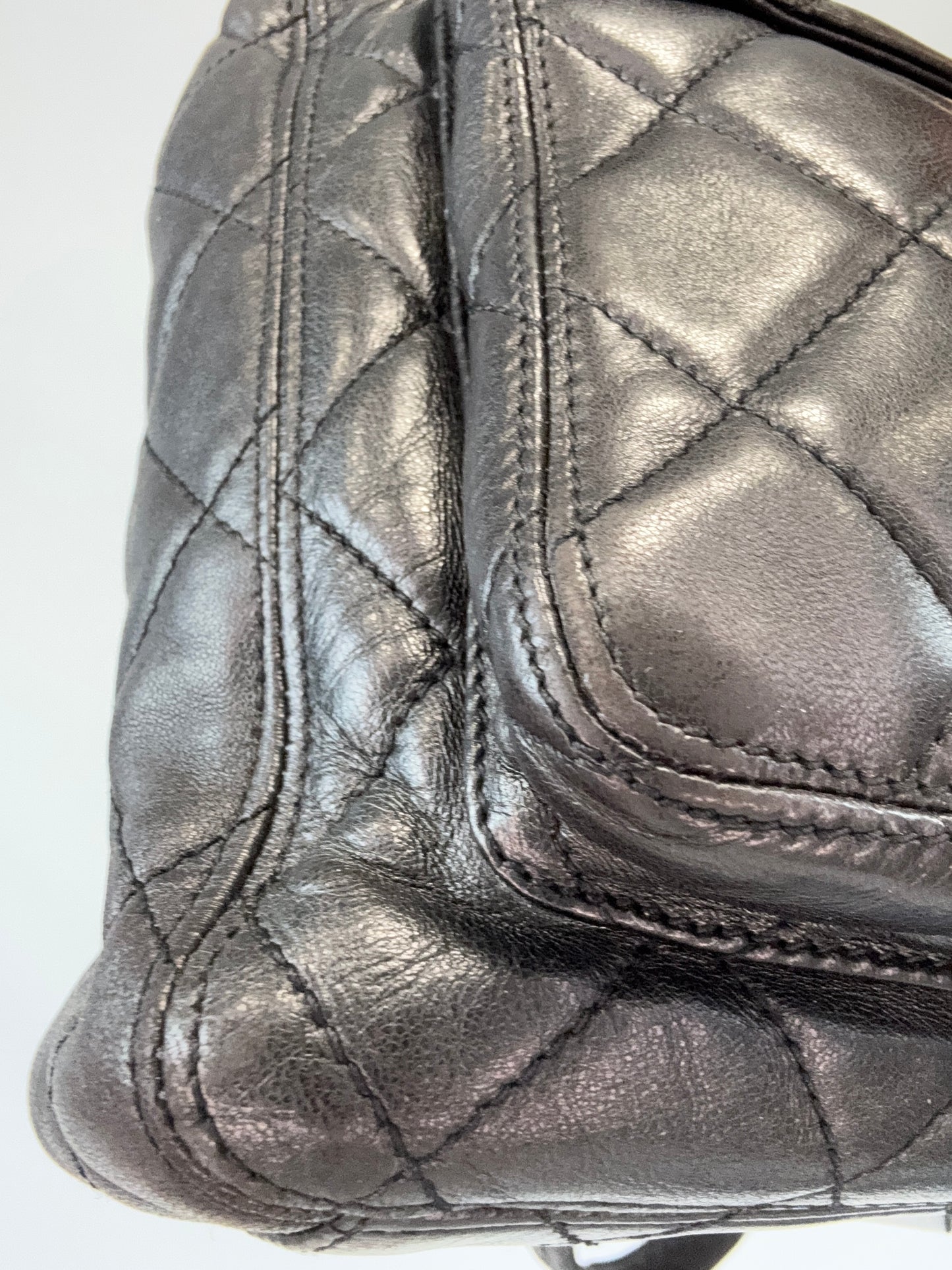 Chanel Quilted Double Pocket Turn Lock Tote front left bottom corner