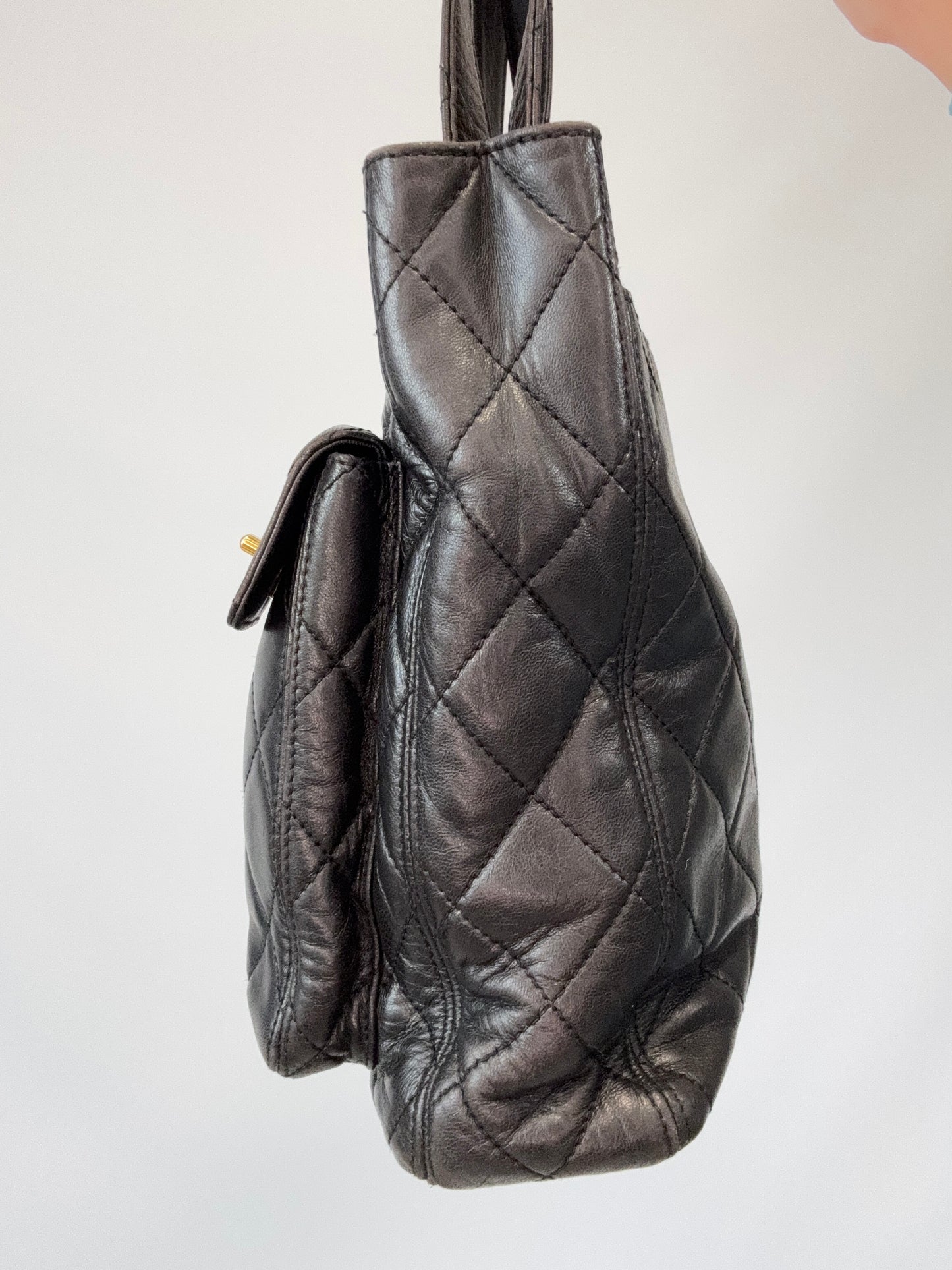 Chanel Quilted Double Pocket Turn Lock Tote right side of handbag