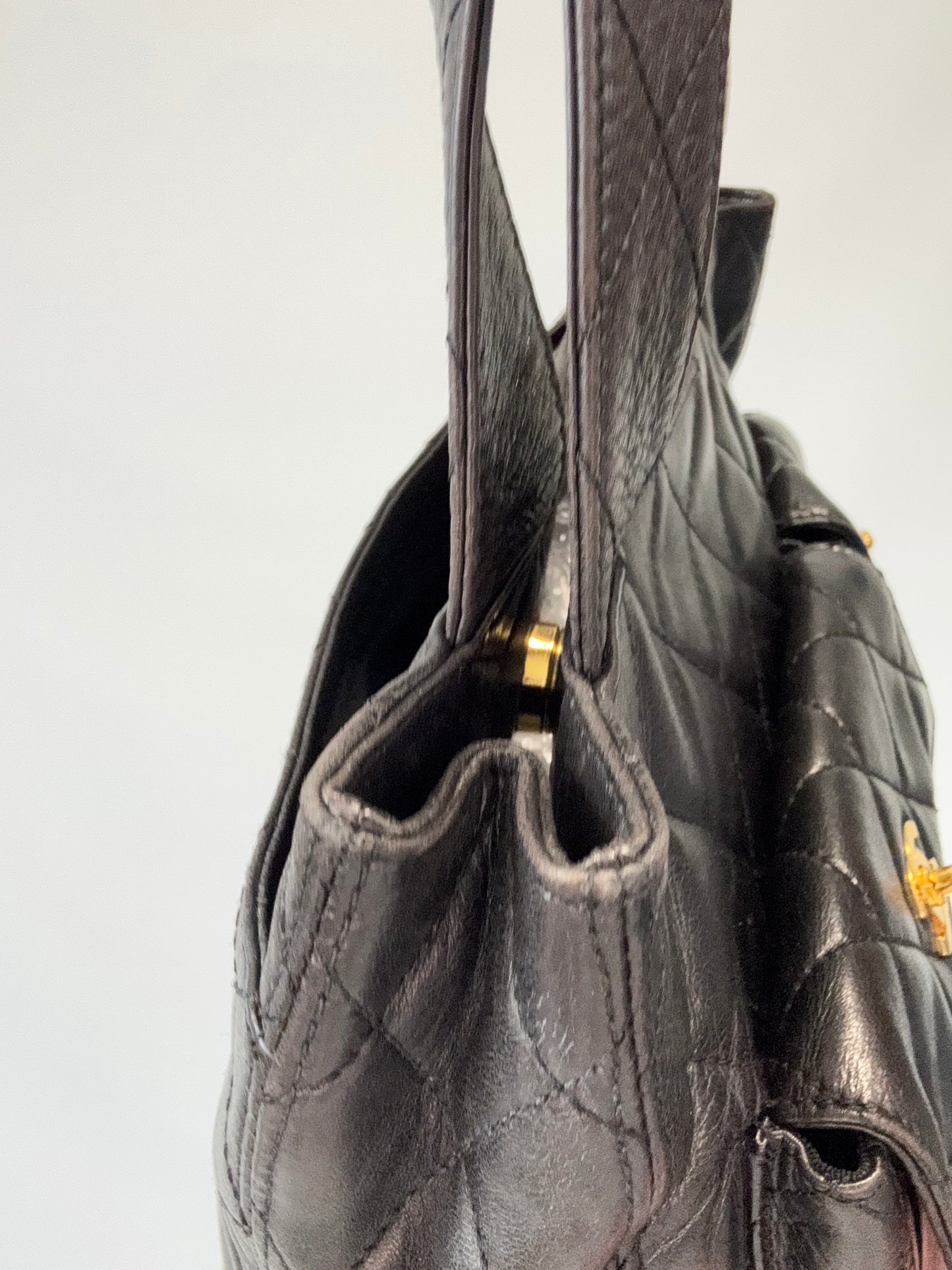 Chanel Quilted Double Pocket Turn Lock Tote side top left