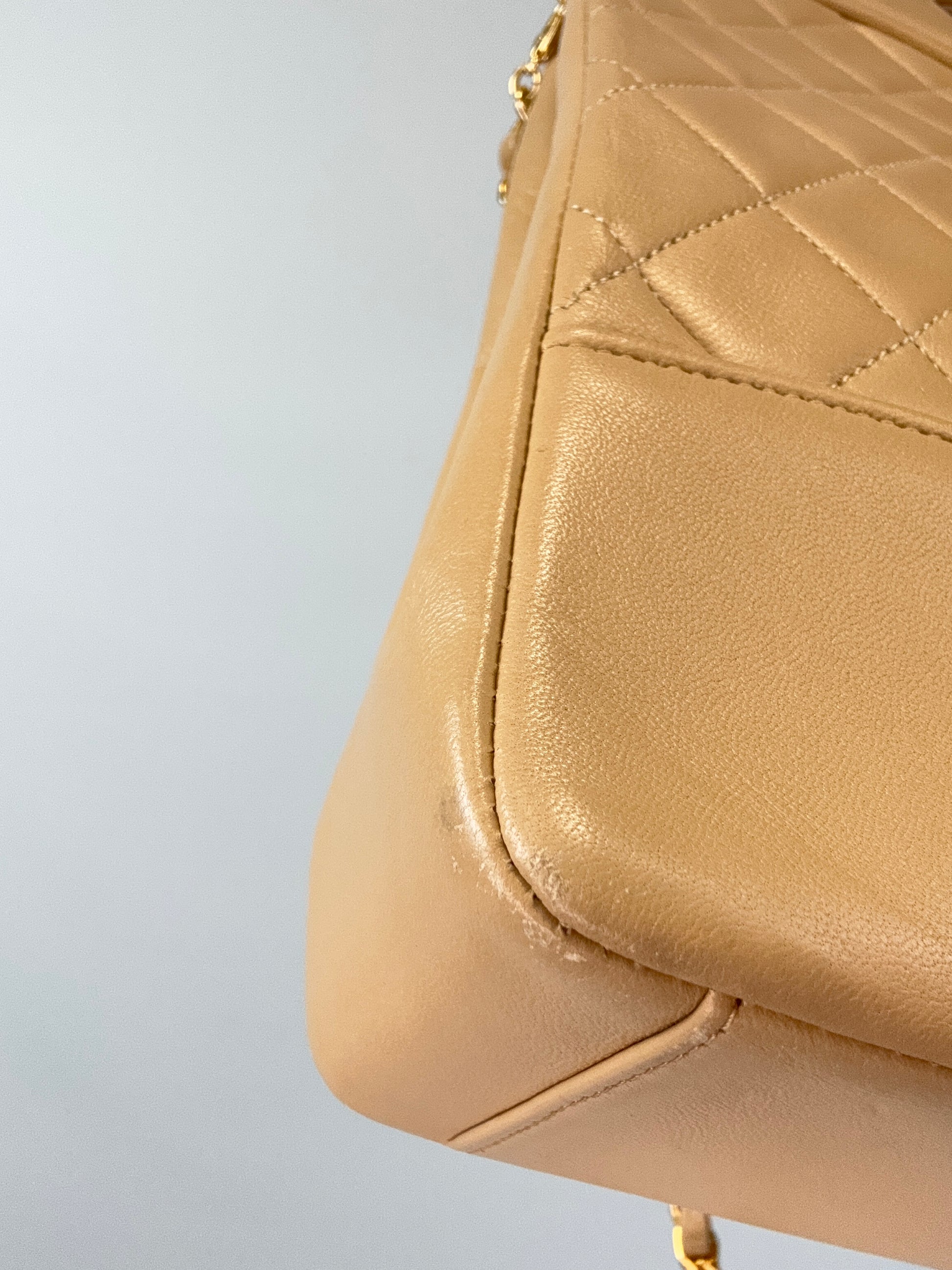 Chanel Quilted Lambskin 31 Shopping Tote in Beige back left bottom corner