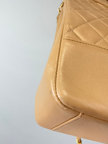 Chanel Quilted Lambskin 31 Shopping Tote in Beige back left bottom corner