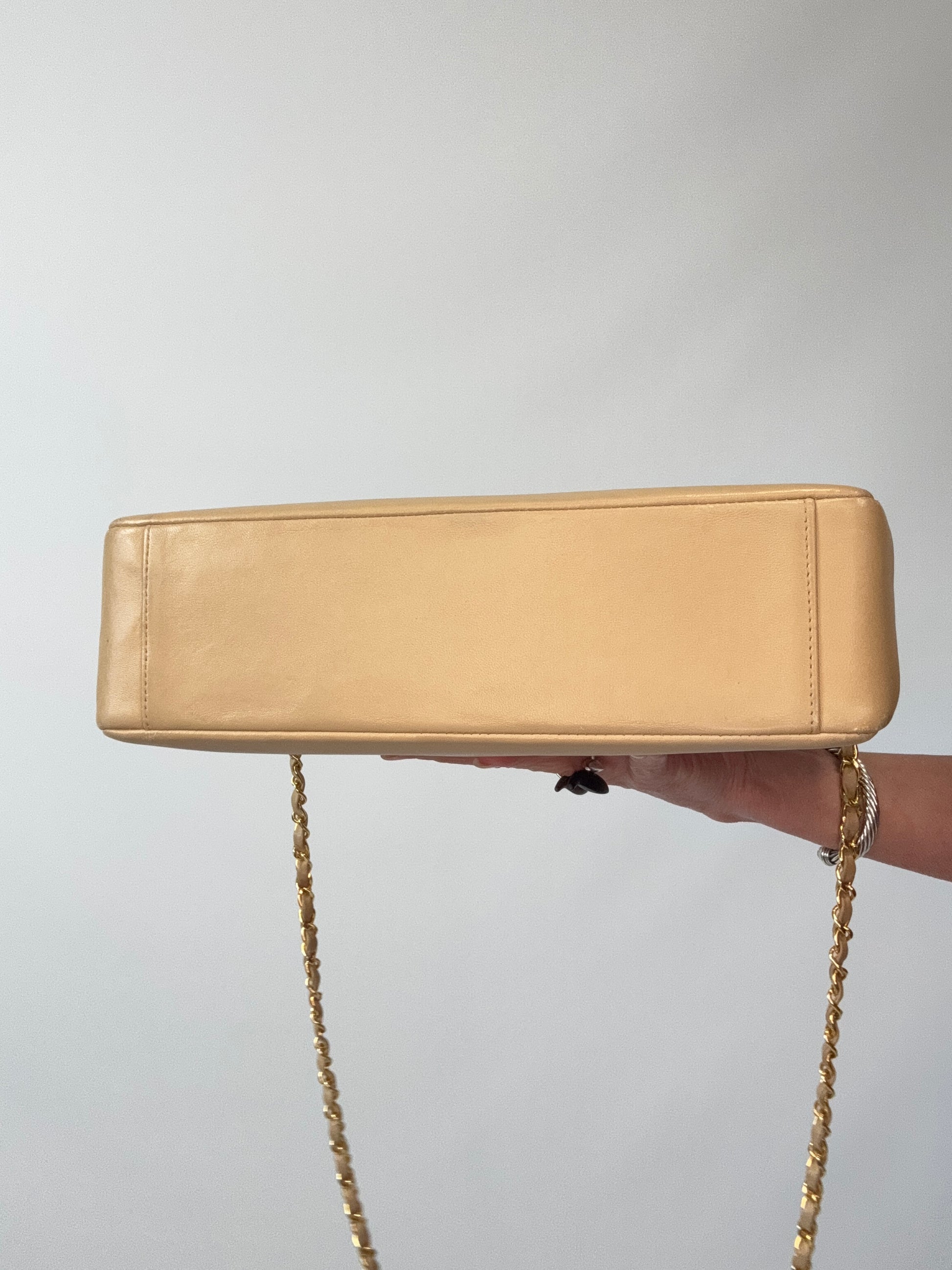 Chanel Quilted Lambskin 31 Shopping Tote in Beige bottom of handbag