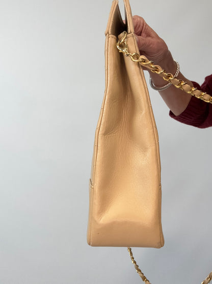 Chanel Quilted Lambskin 31 Shopping Tote in Beige right side of handbag