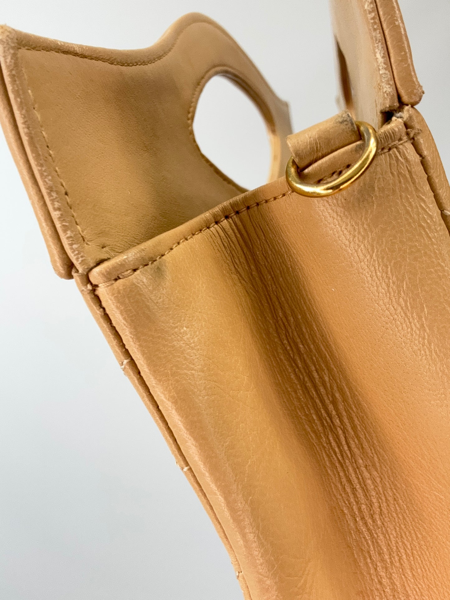 Chanel Quilted Lambskin 31 Shopping Tote in Beige upper left leather wear