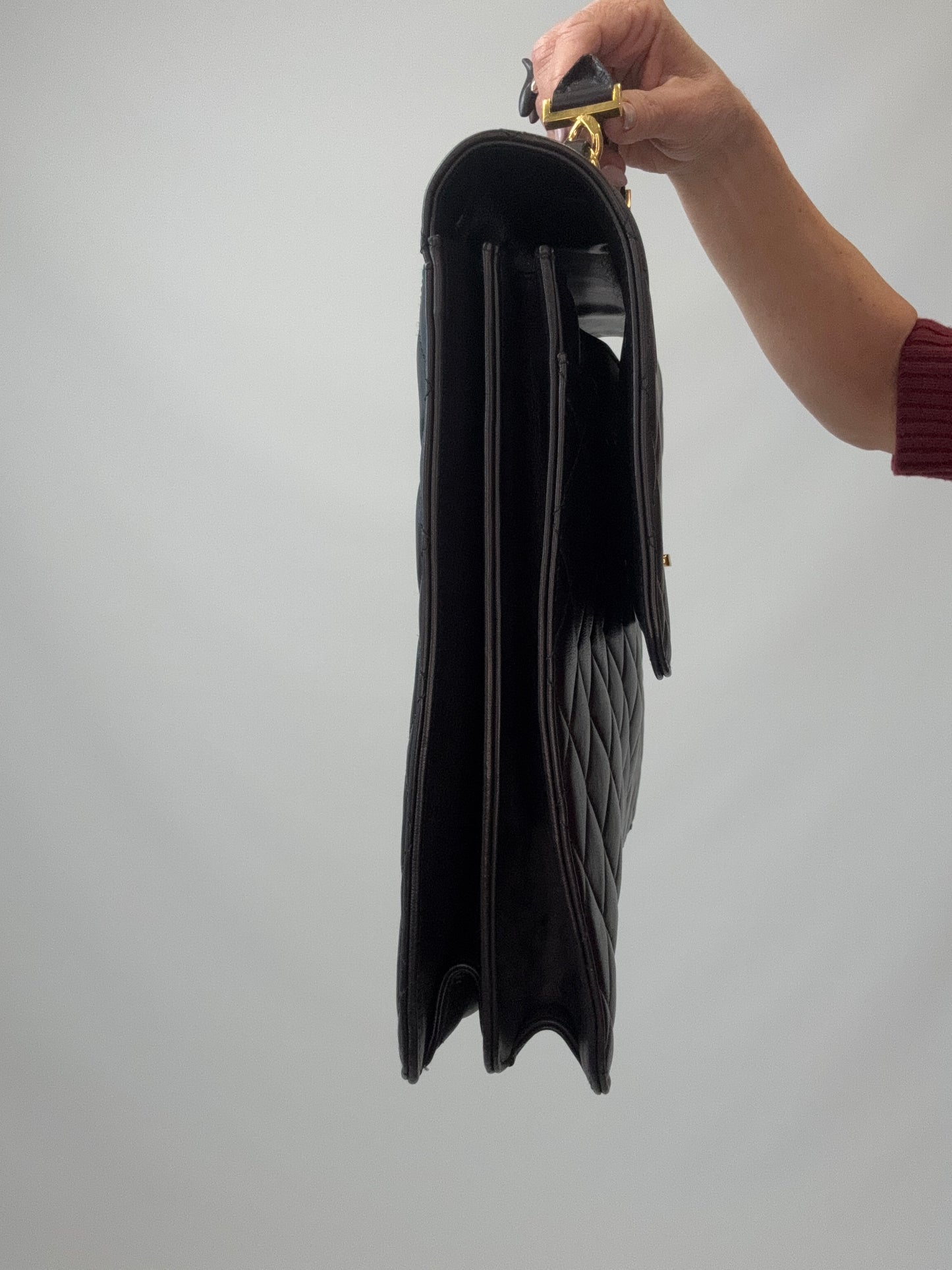 Chanel Quilted Lambskin Briefcase Business Bag in Black left side of handbag