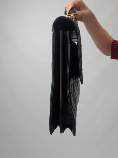 Chanel Quilted Lambskin Briefcase Business Bag in Black left side of handbag