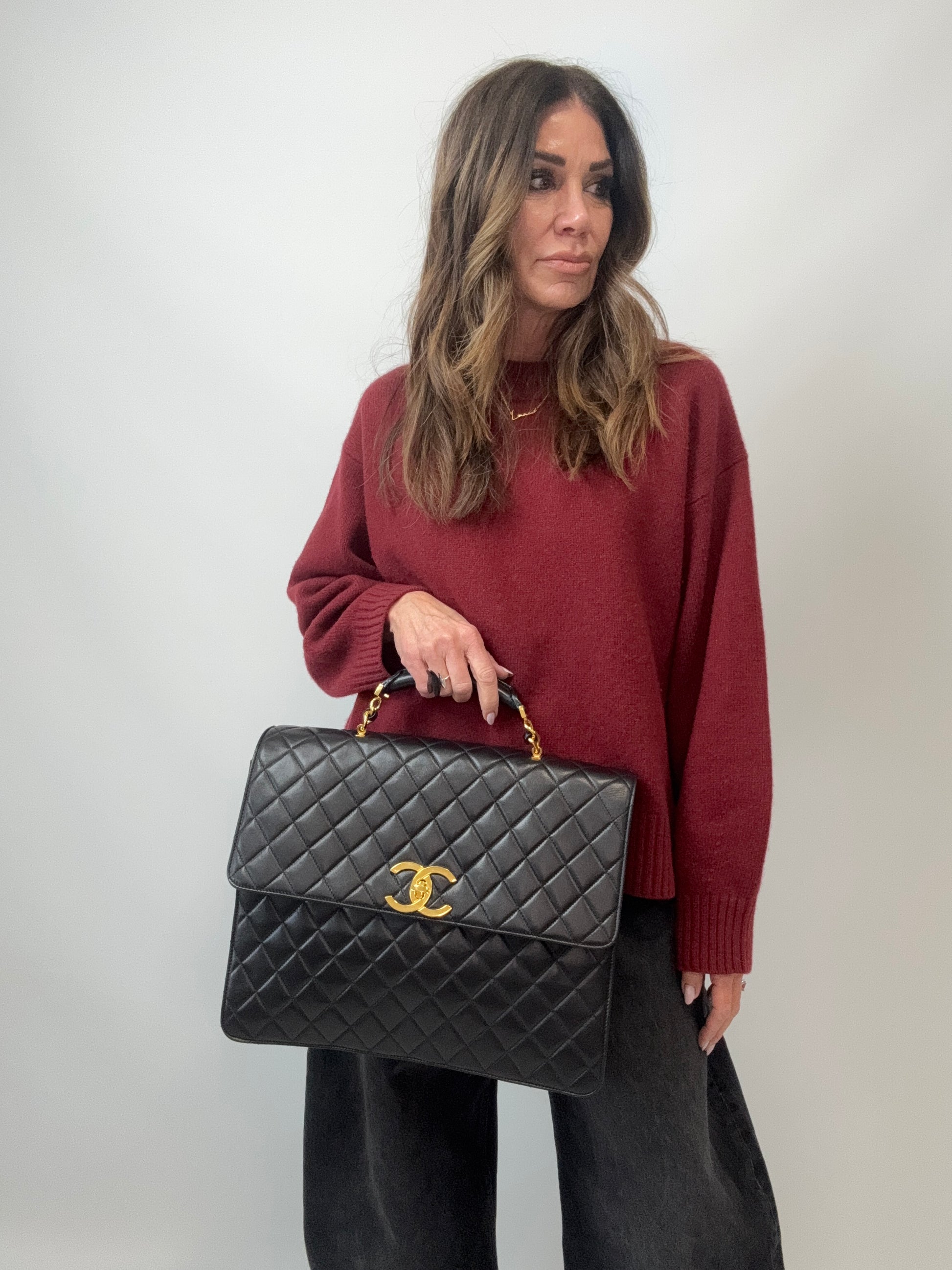 Chanel Quilted Lambskin Briefcase Business Bag in Black modeled