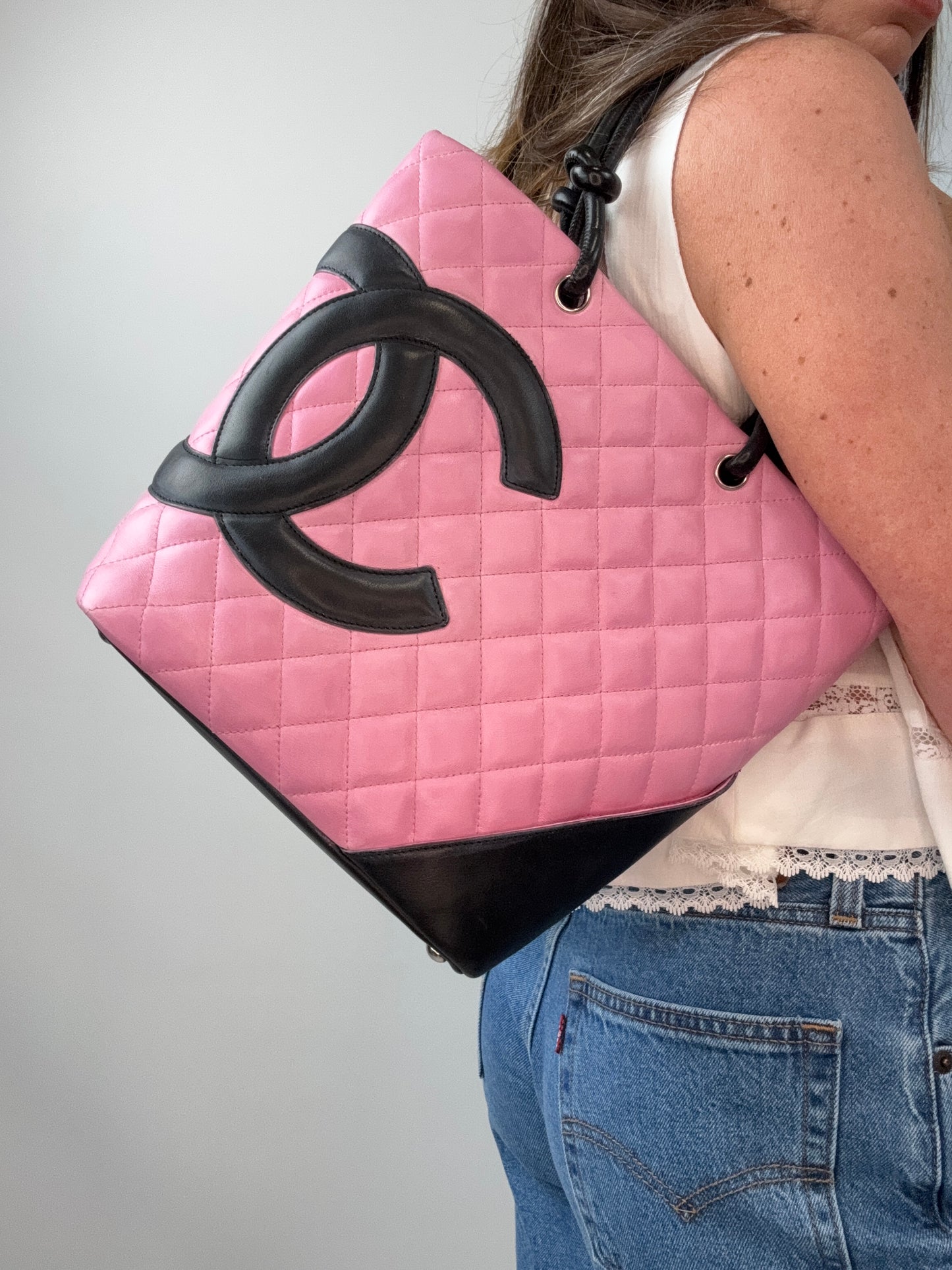 Chanel Quilted Lambskin Cambon Tote Pink modeled