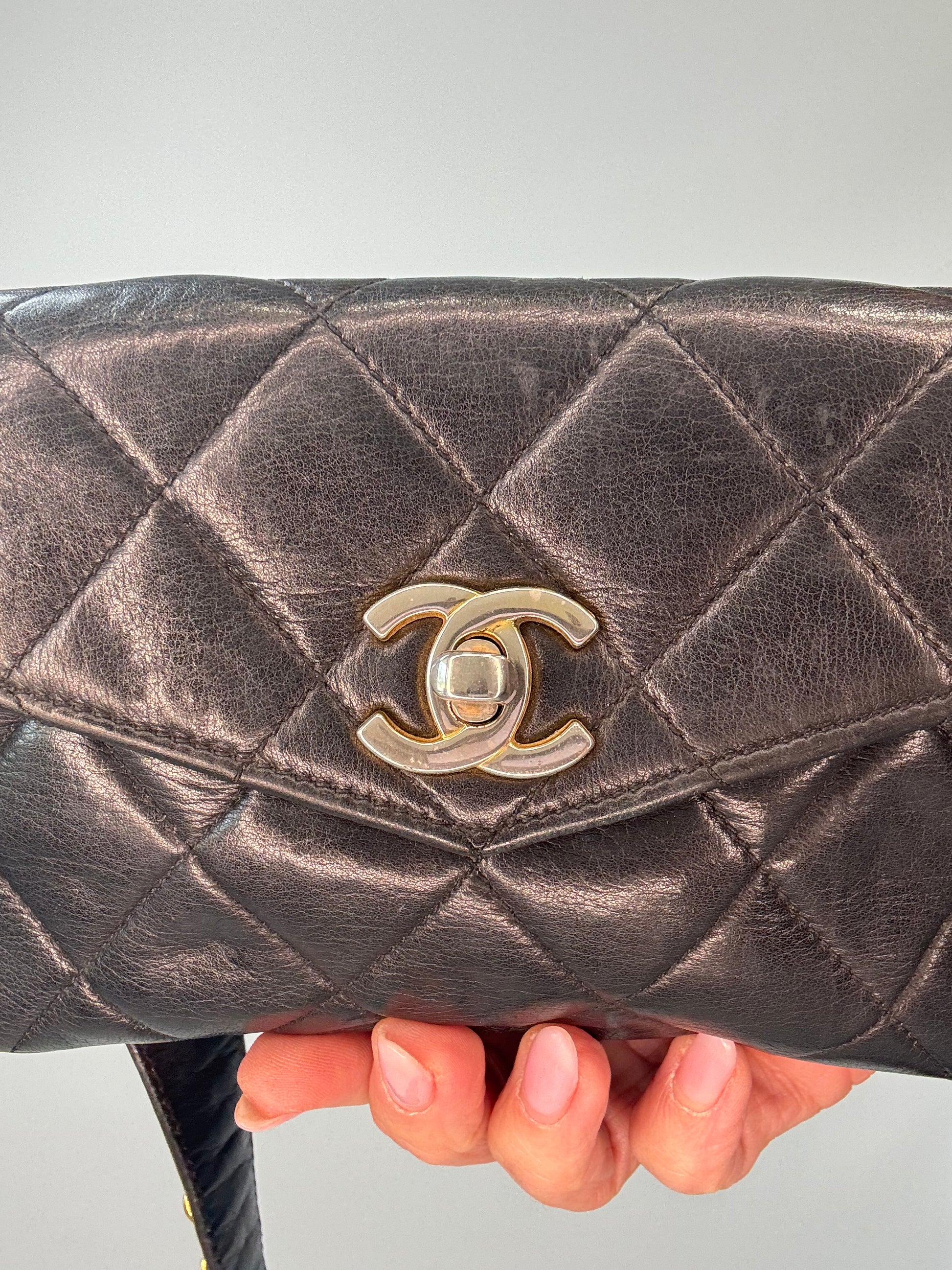 Chanel Quilted Lambskin Envelope Waist Bag flap close up