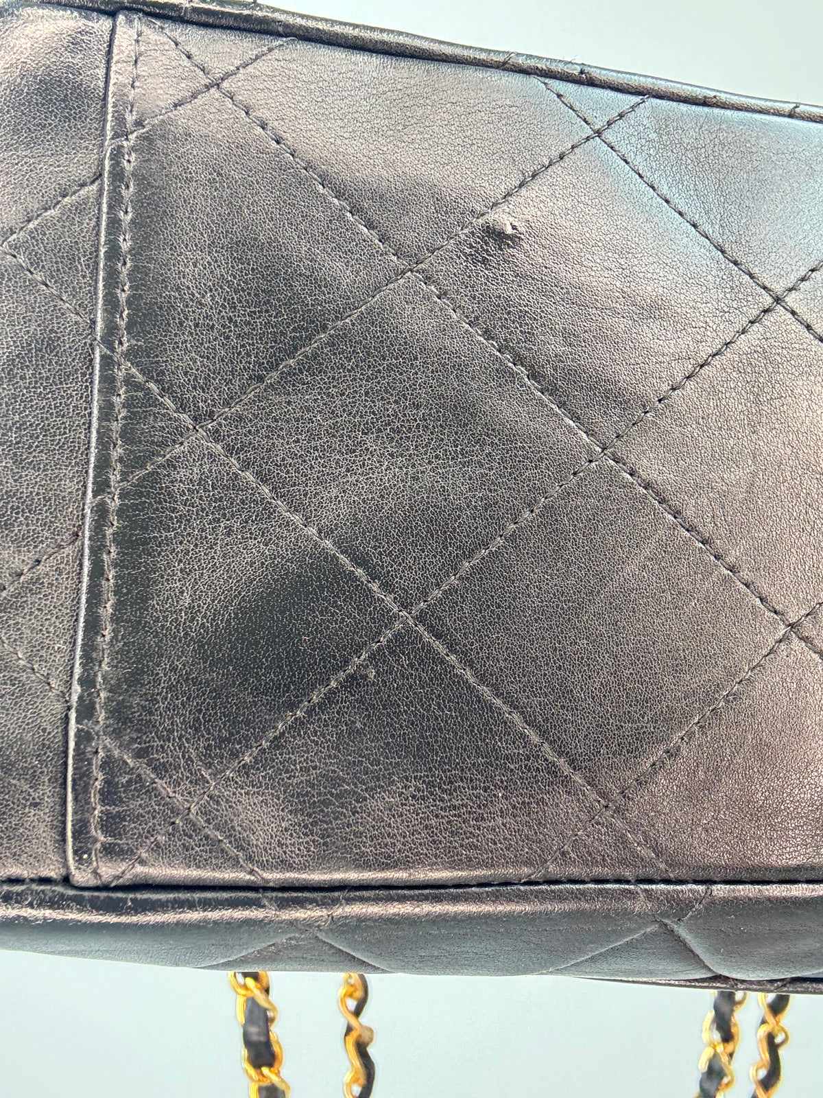 Chanel Quilted Lambskin Jumbo Single Flap Bag bottom left close up