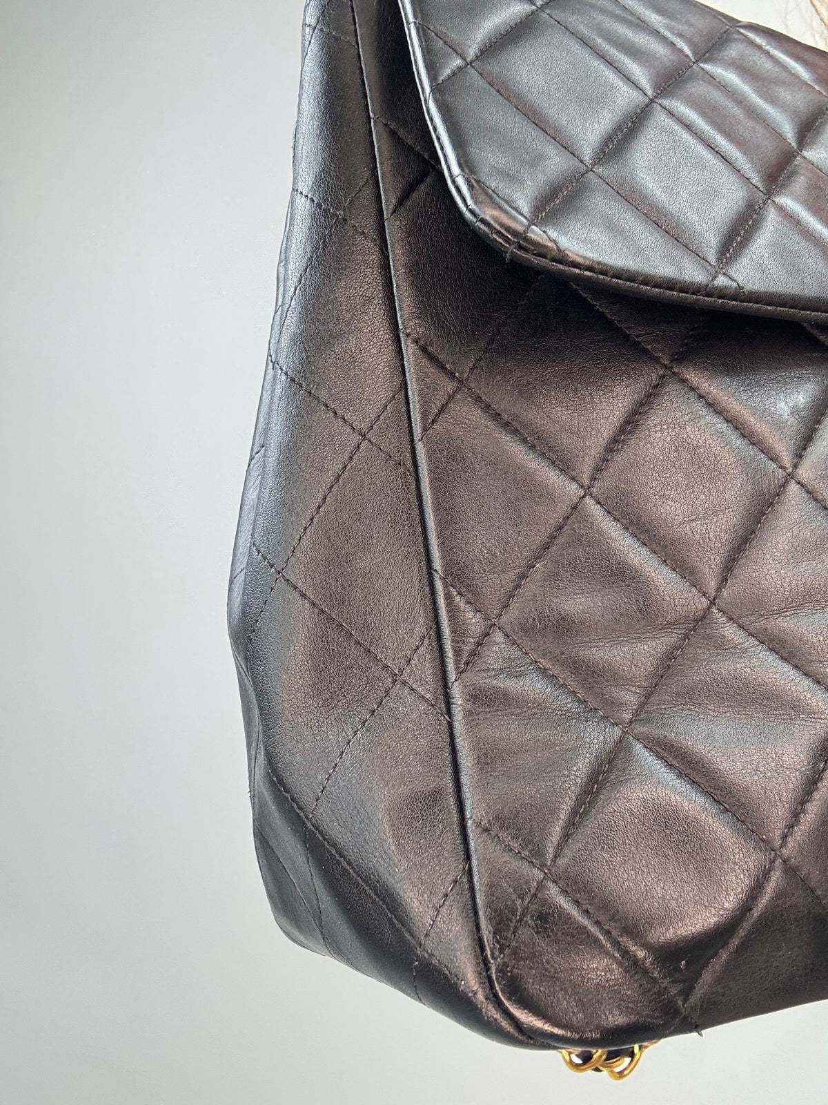 Chanel Quilted Lambskin Jumbo Single Flap Bag front left side