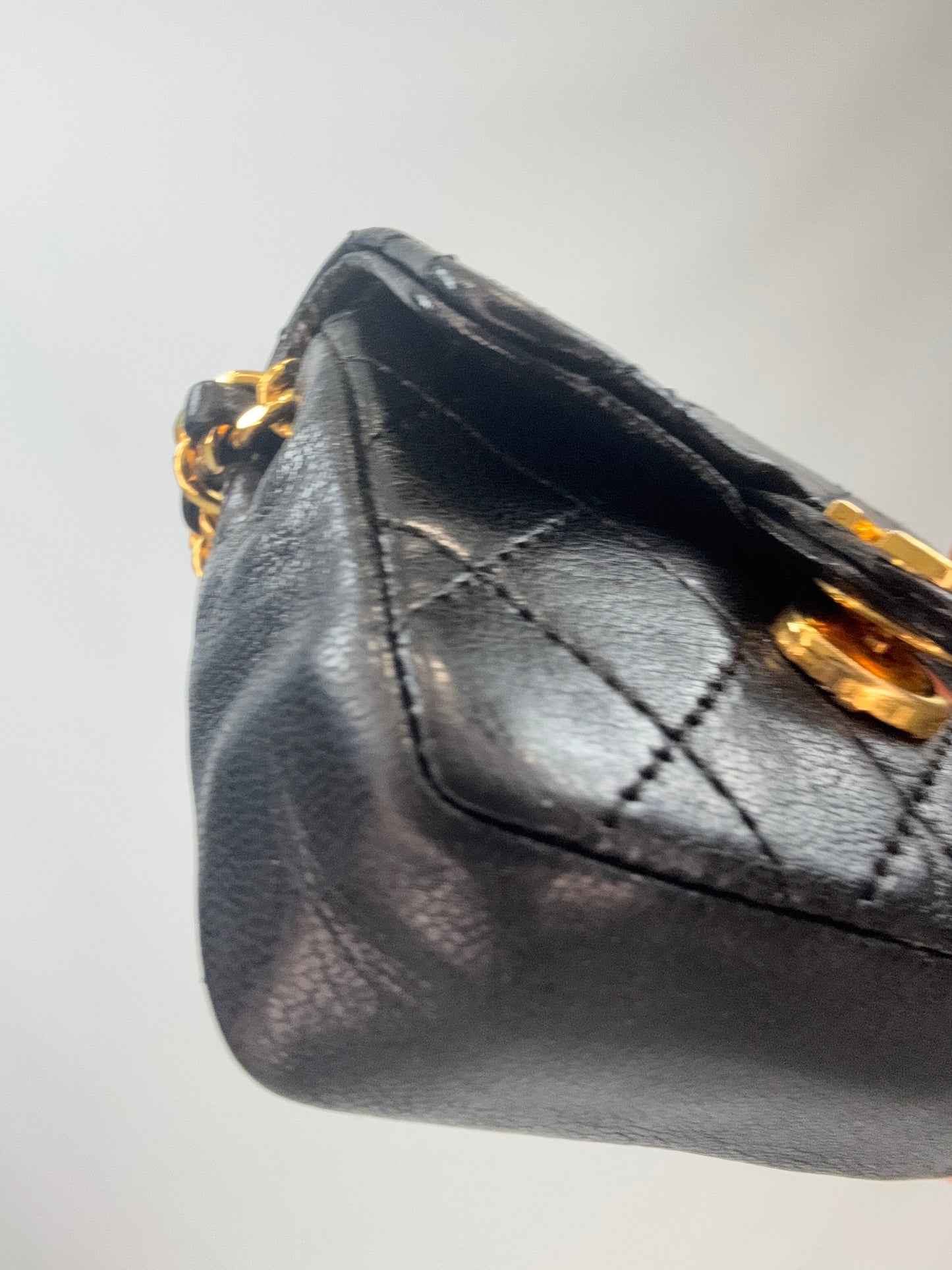 Chanel Quilted Lambskin Micro Mini Belt Bag - Black front left bottom corner