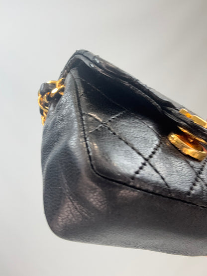 Chanel Quilted Lambskin Micro Mini Belt Bag - Black front left bottom corner