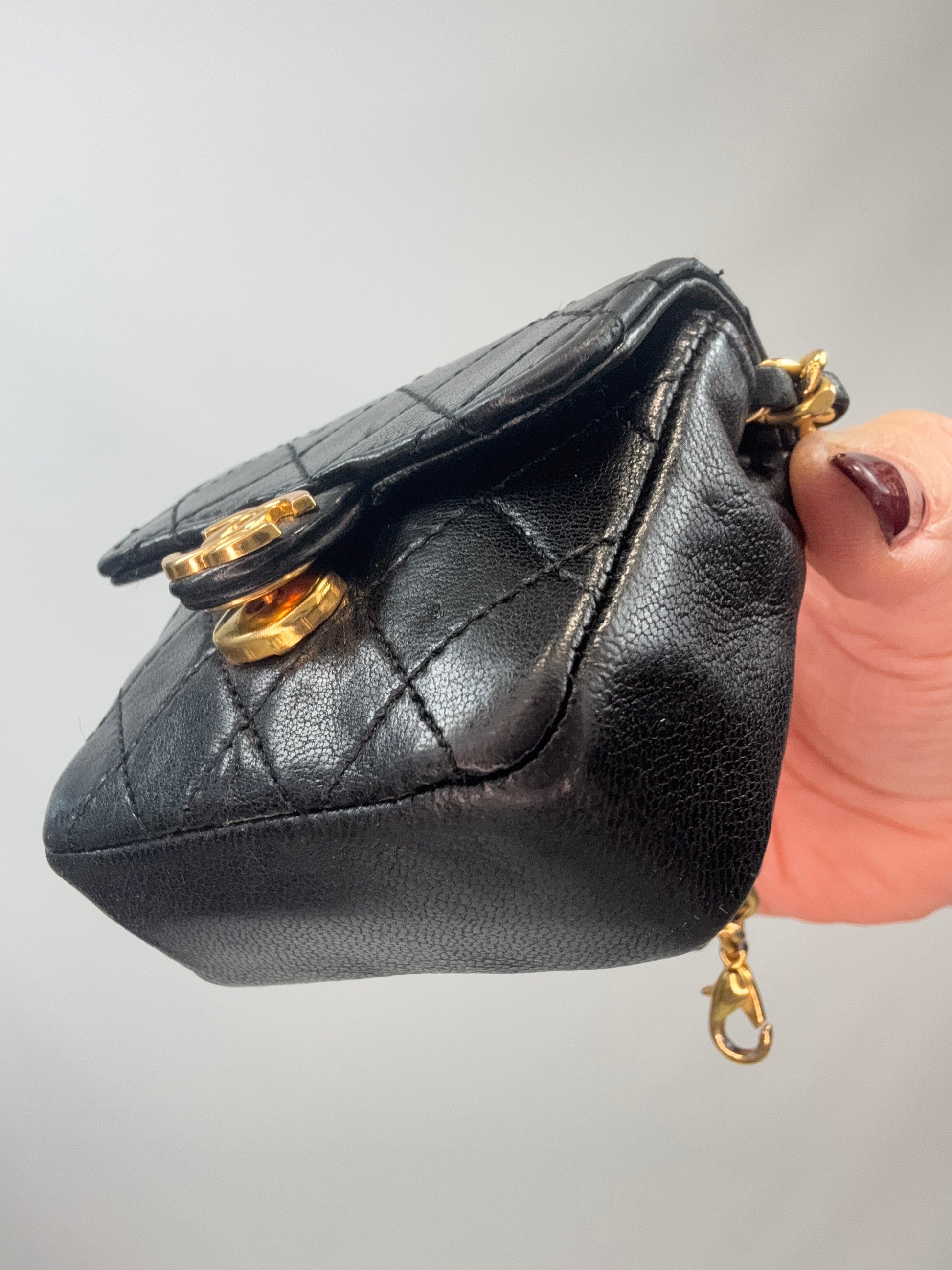 Chanel Quilted Lambskin Micro Mini Belt Bag - Black front right bottom corner