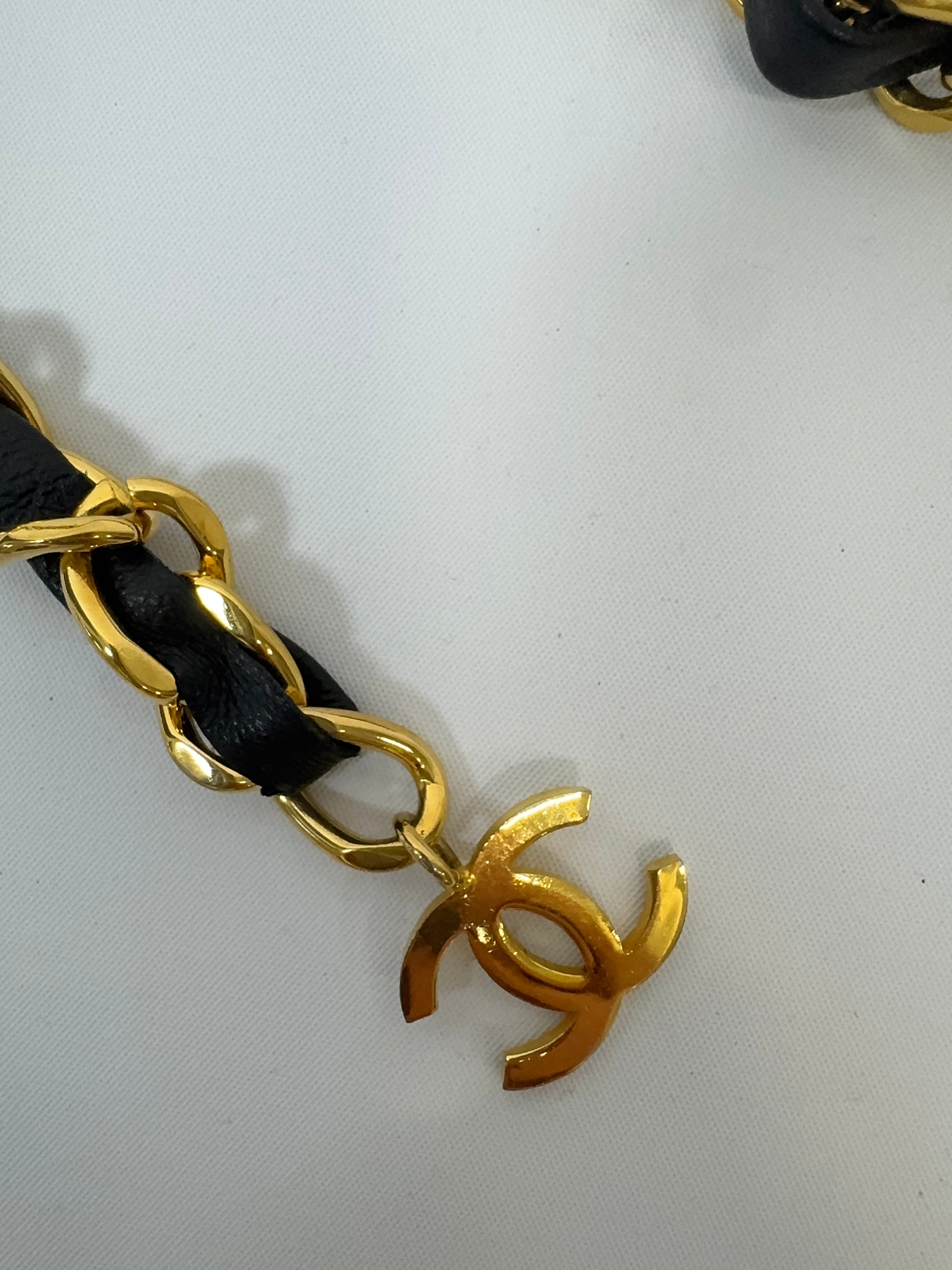 Chanel Quilted Lambskin Micro Mini Belt Bag - Black gold logo charm