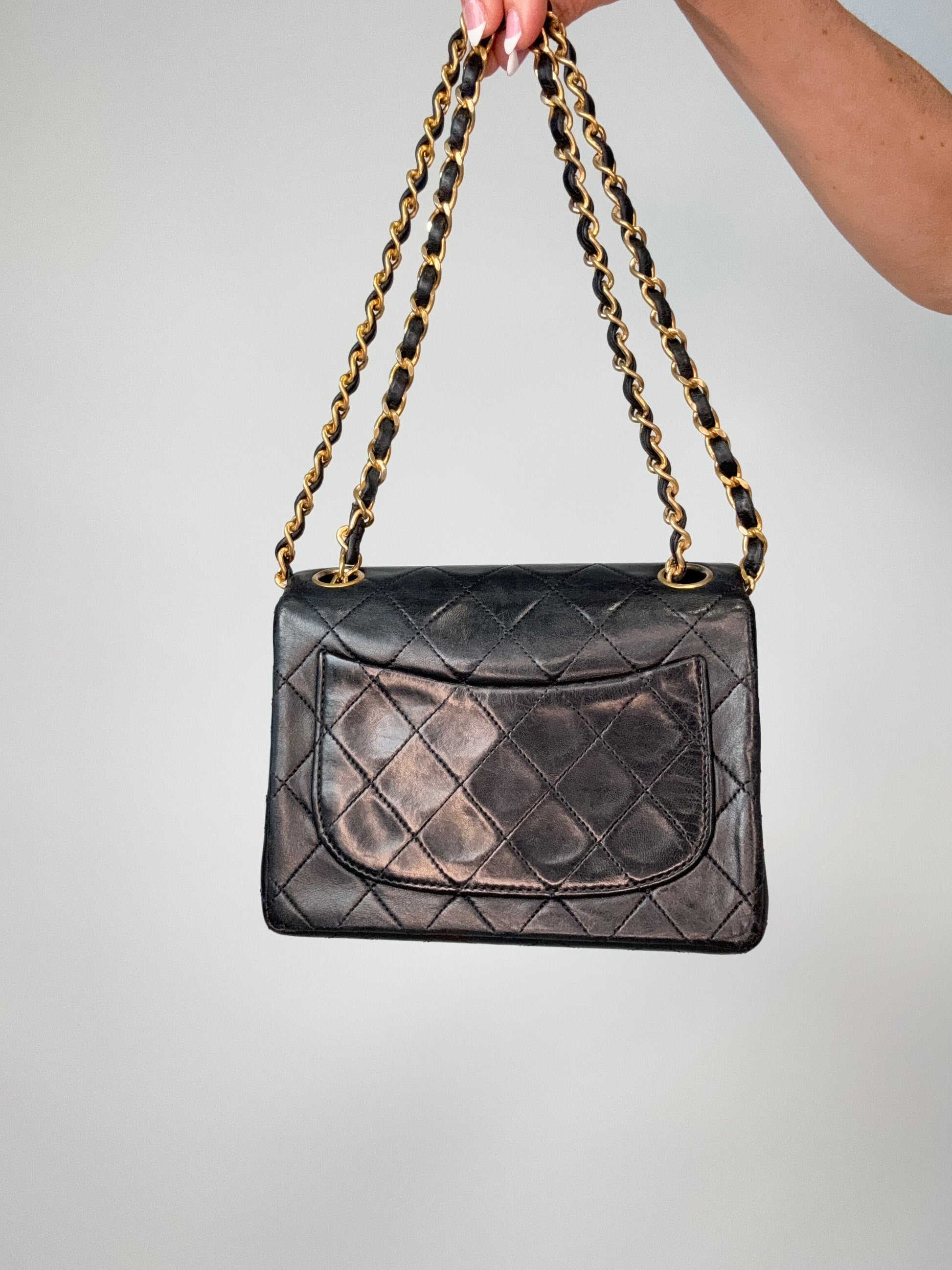 Chanel Quilted Lambskin Mini Square Flap Bag back of handbag