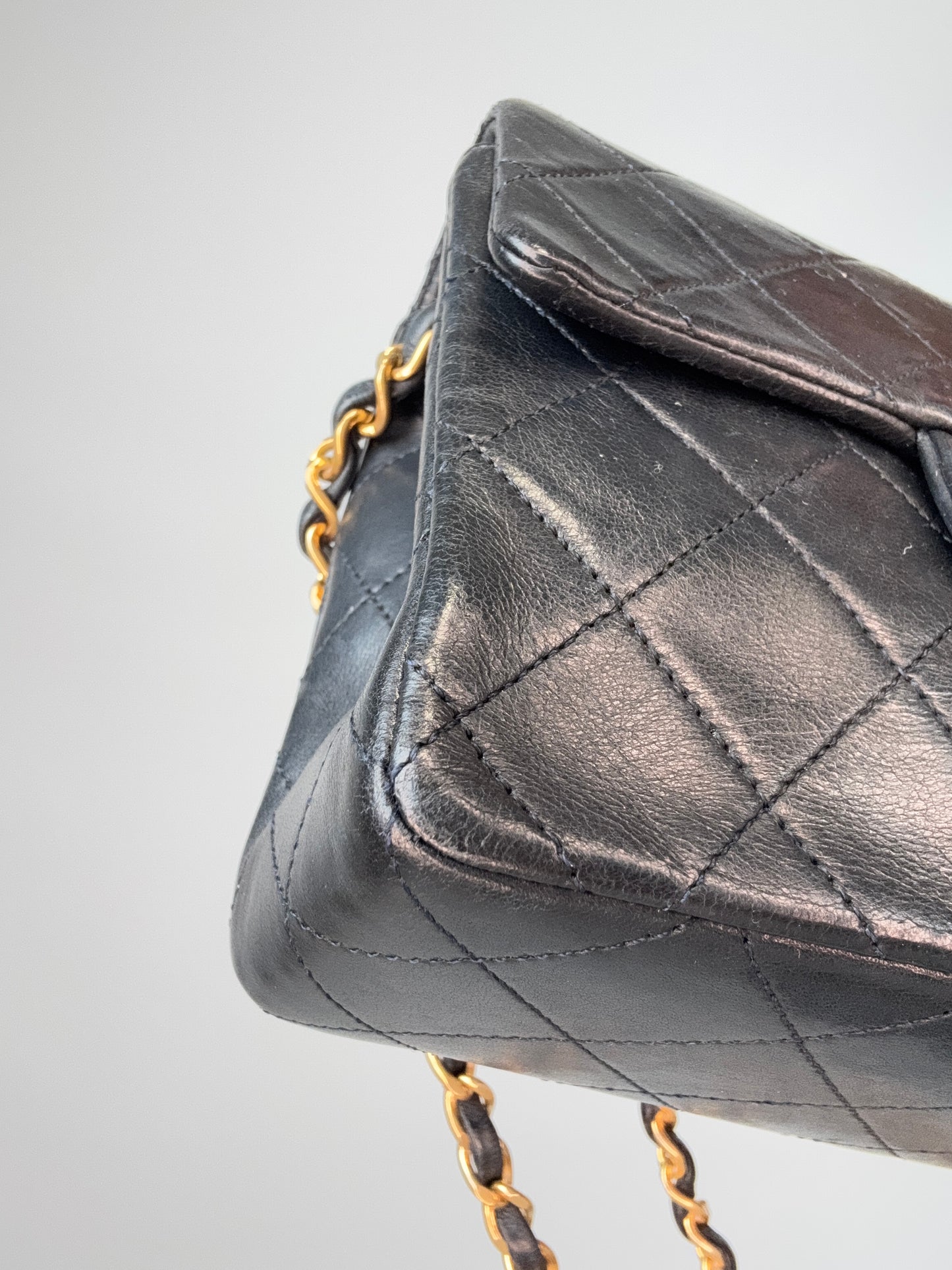 Chanel Quilted Lambskin Mini Square Flap Bag front left bottom corner