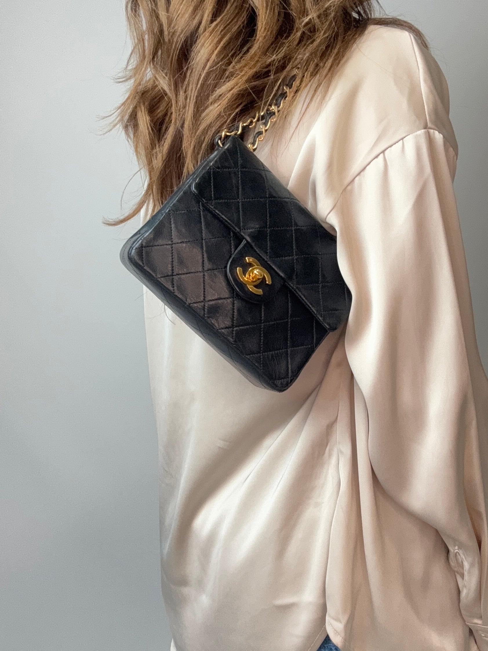 Chanel Quilted Lambskin Mini Square Flap Bag modeled