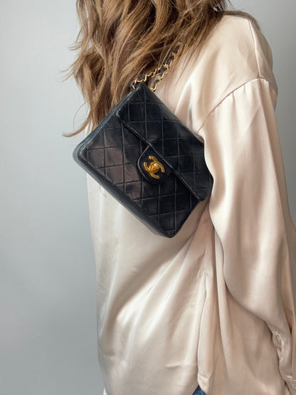 Chanel Quilted Lambskin Mini Square Flap Bag modeled