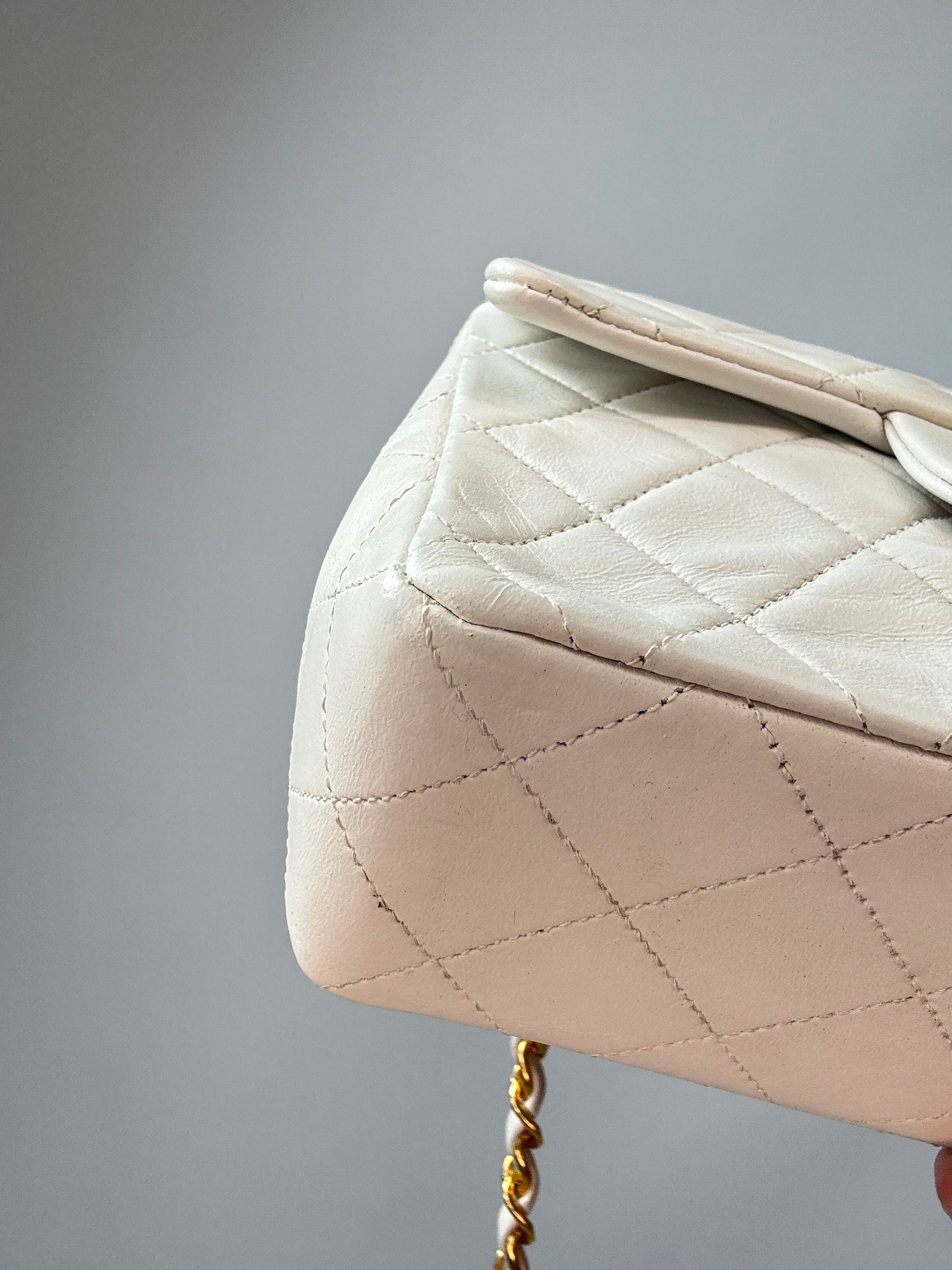 Chanel Quilted Lambskin Mini Square Flap Bag Vintage front left bottom corner