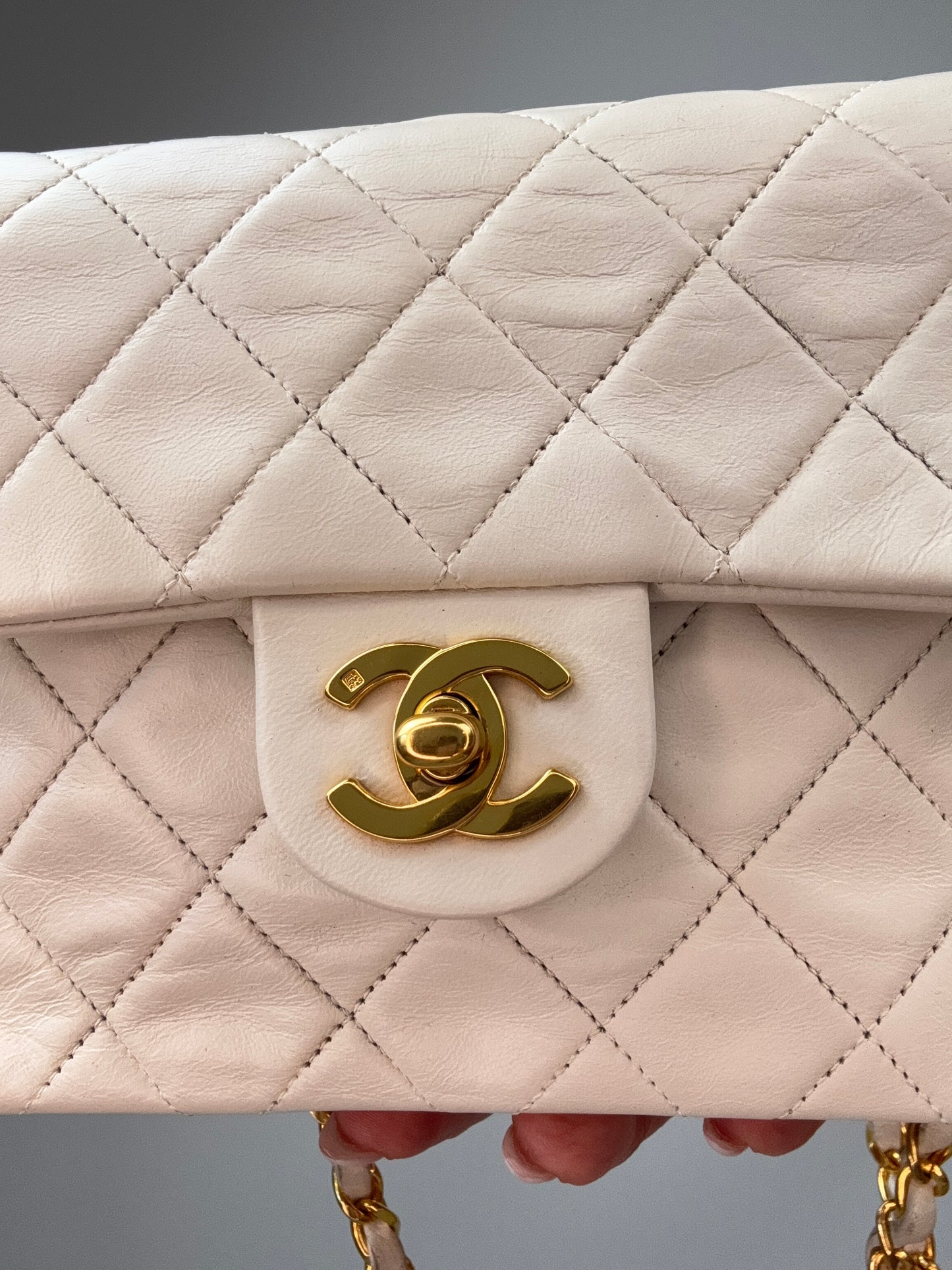 Chanel Quilted Lambskin Mini Square Flap Bag Vintage turn lock close up
