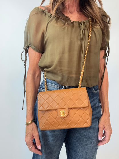 Chanel Quilted Lambskin Single Flap Bag modeled 2